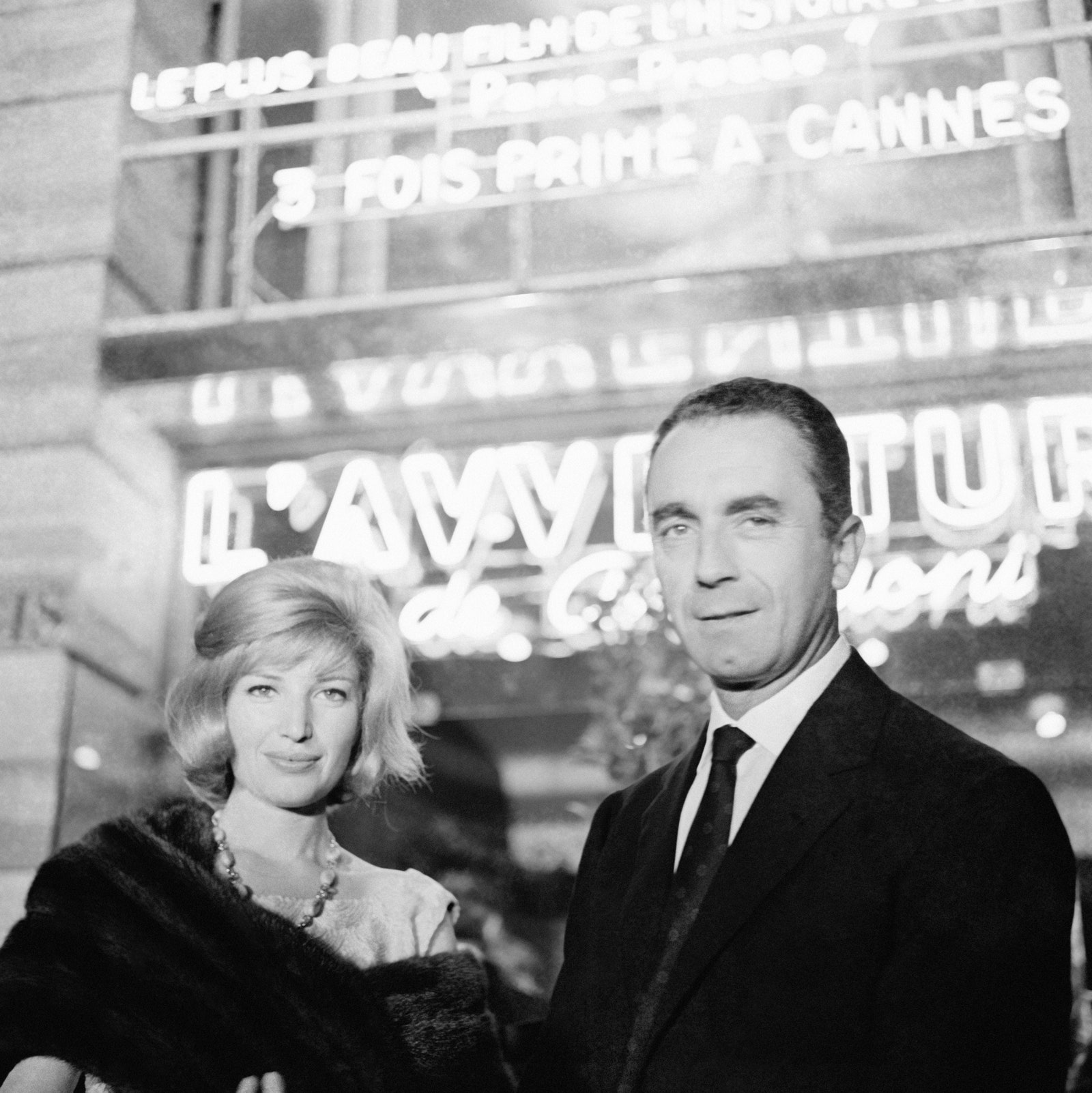 Images may contain Michelangelo Antonioni Monica Vitti outfit formally wearing blazer face and person