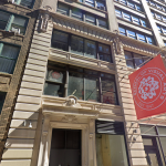 Build a facade with red flags during sunlight.
