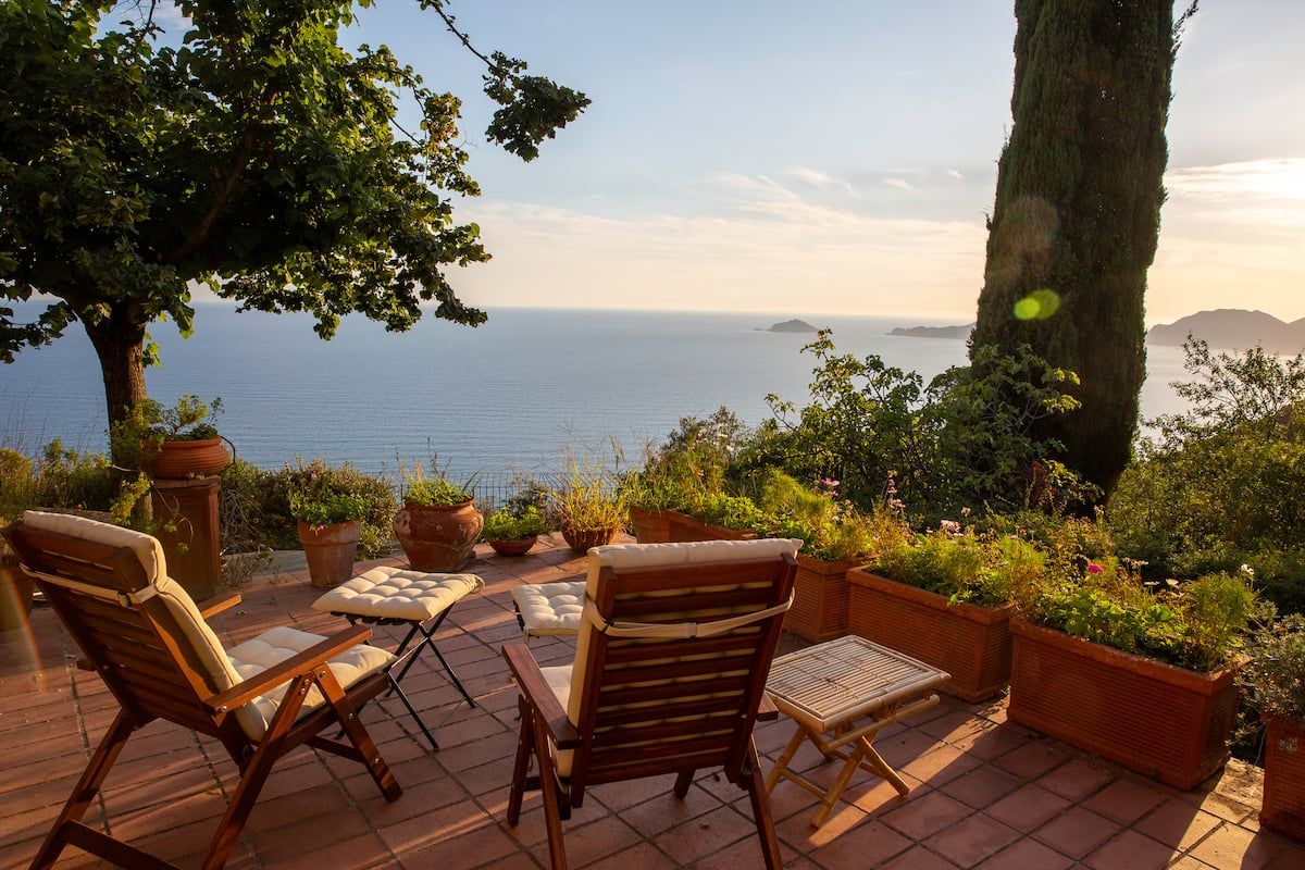 Images may contain natural outdoor scenery chair furniture factory and lakeside