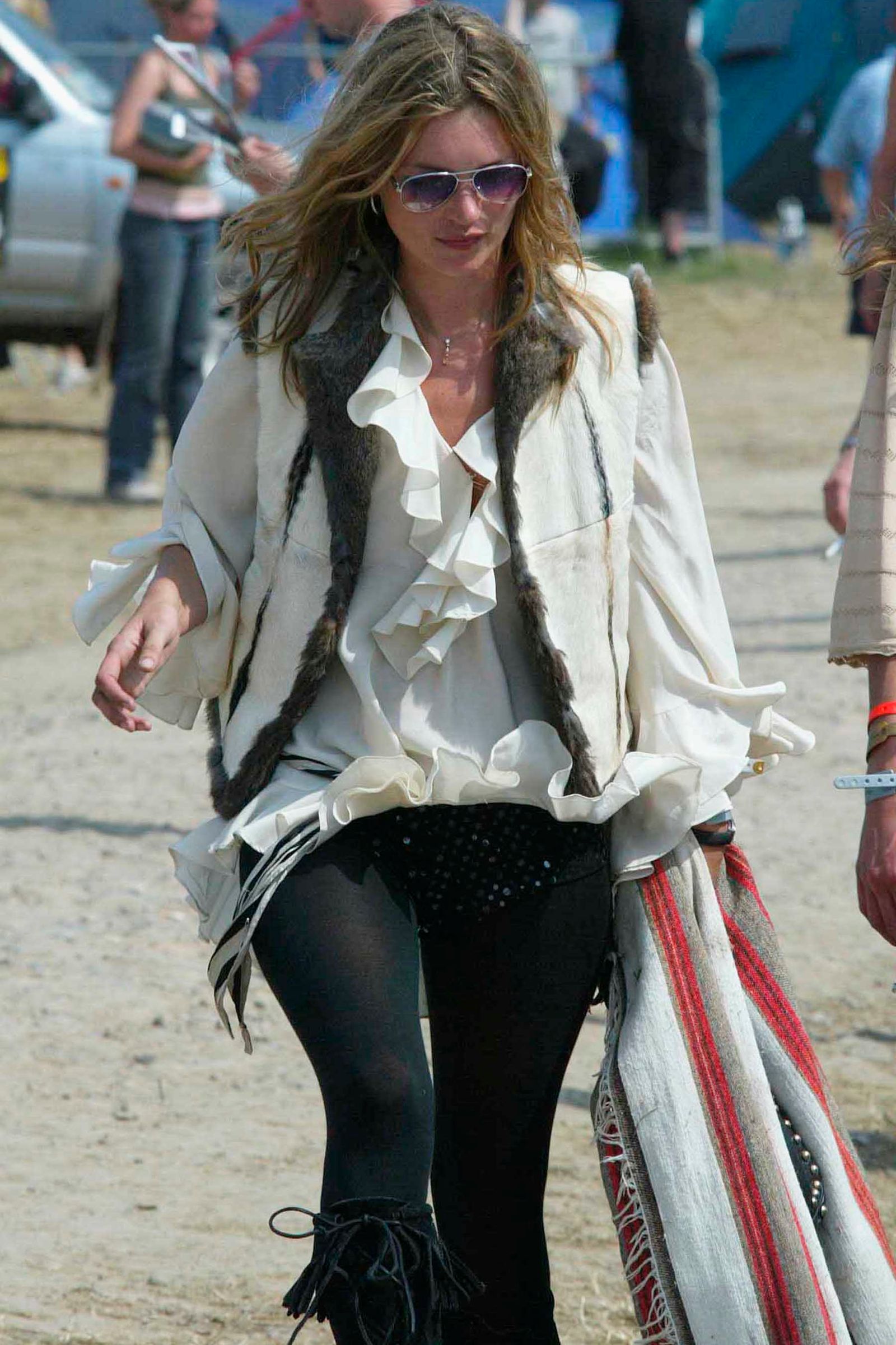 Images may contain Kate Moss adult accessories glasses shirt clothing car transporter and teenagers