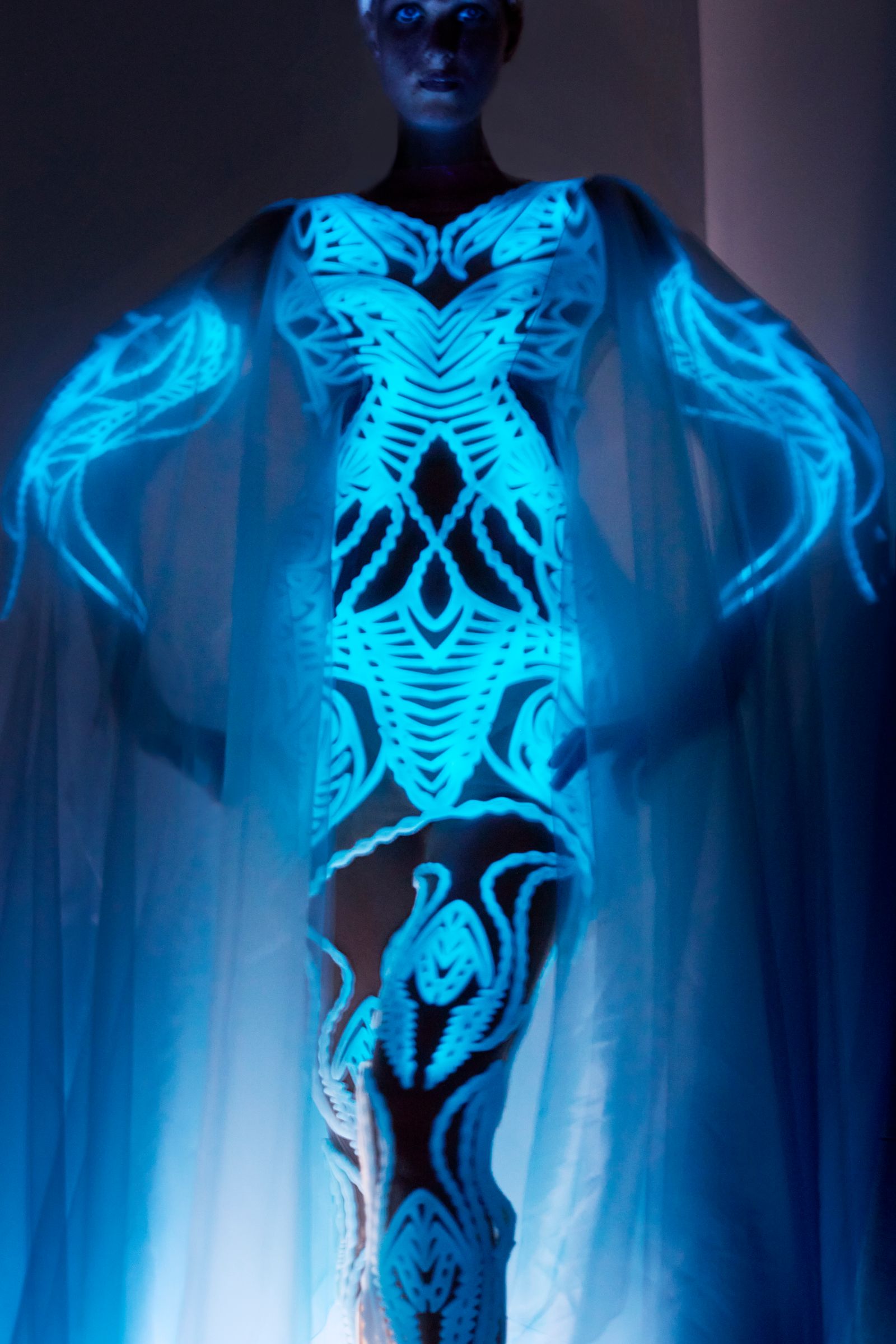 Images may contain fashionable cape costume adult dress formally wearing a dress face and head