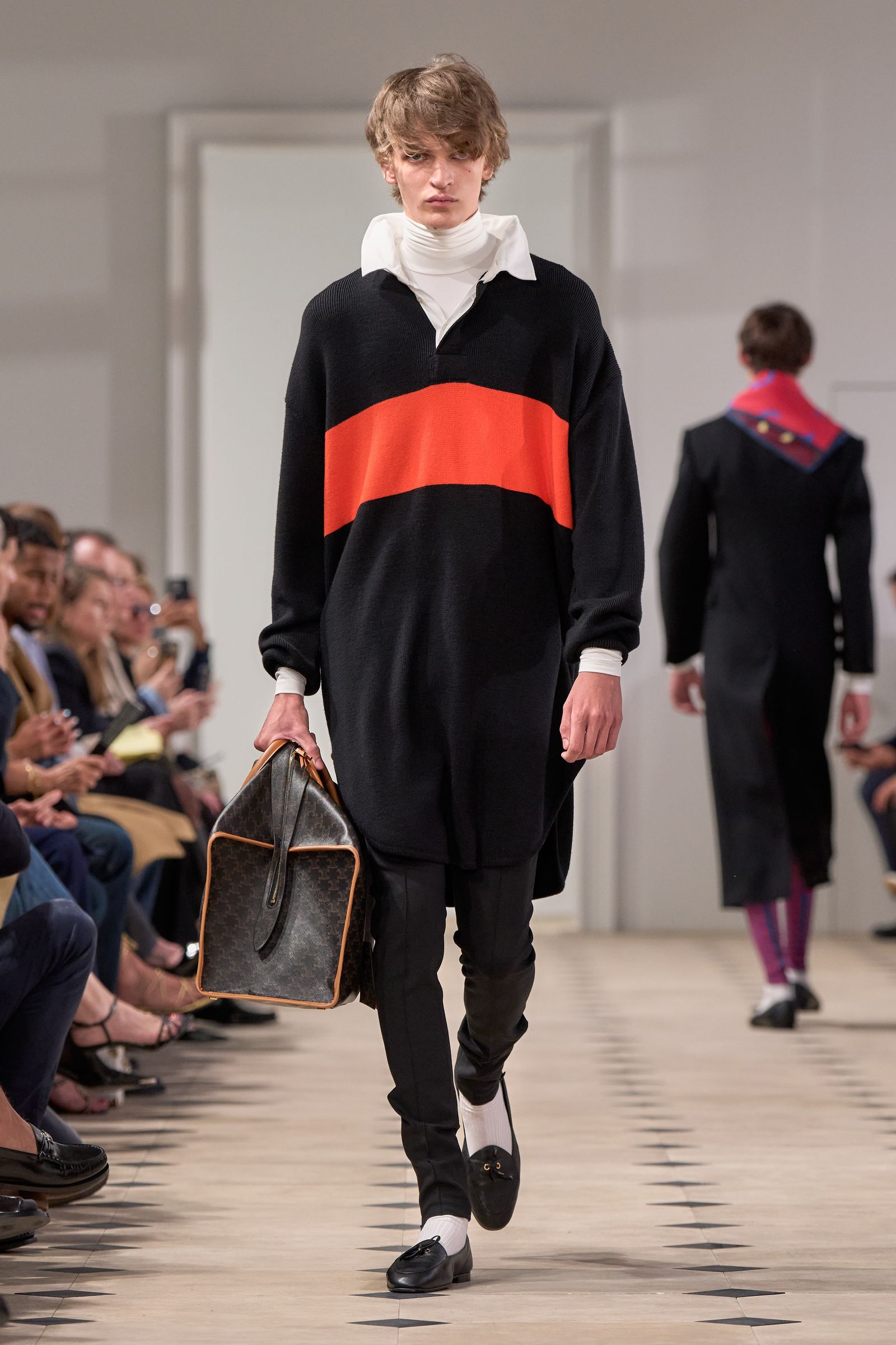 Images may contain Niels Schneider Accessories Bags Handbags Clothing Shoes Shoes Long Sleeves and People
