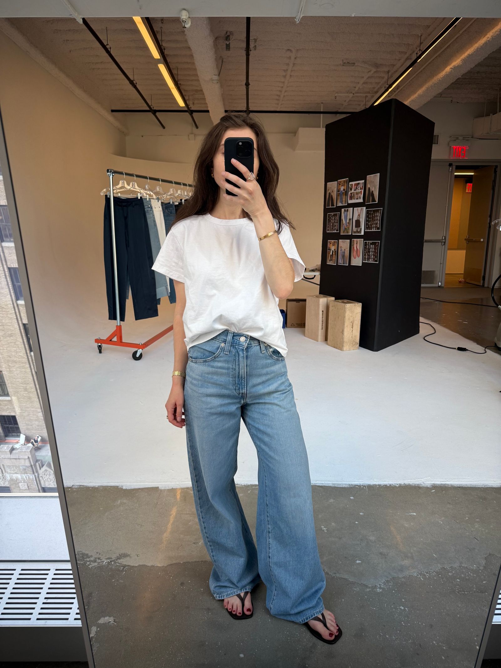 Image may contain Clothing Jeans Pants Adult Person Footwear Shoe Accessories Bracelet Jewelry and Electronics