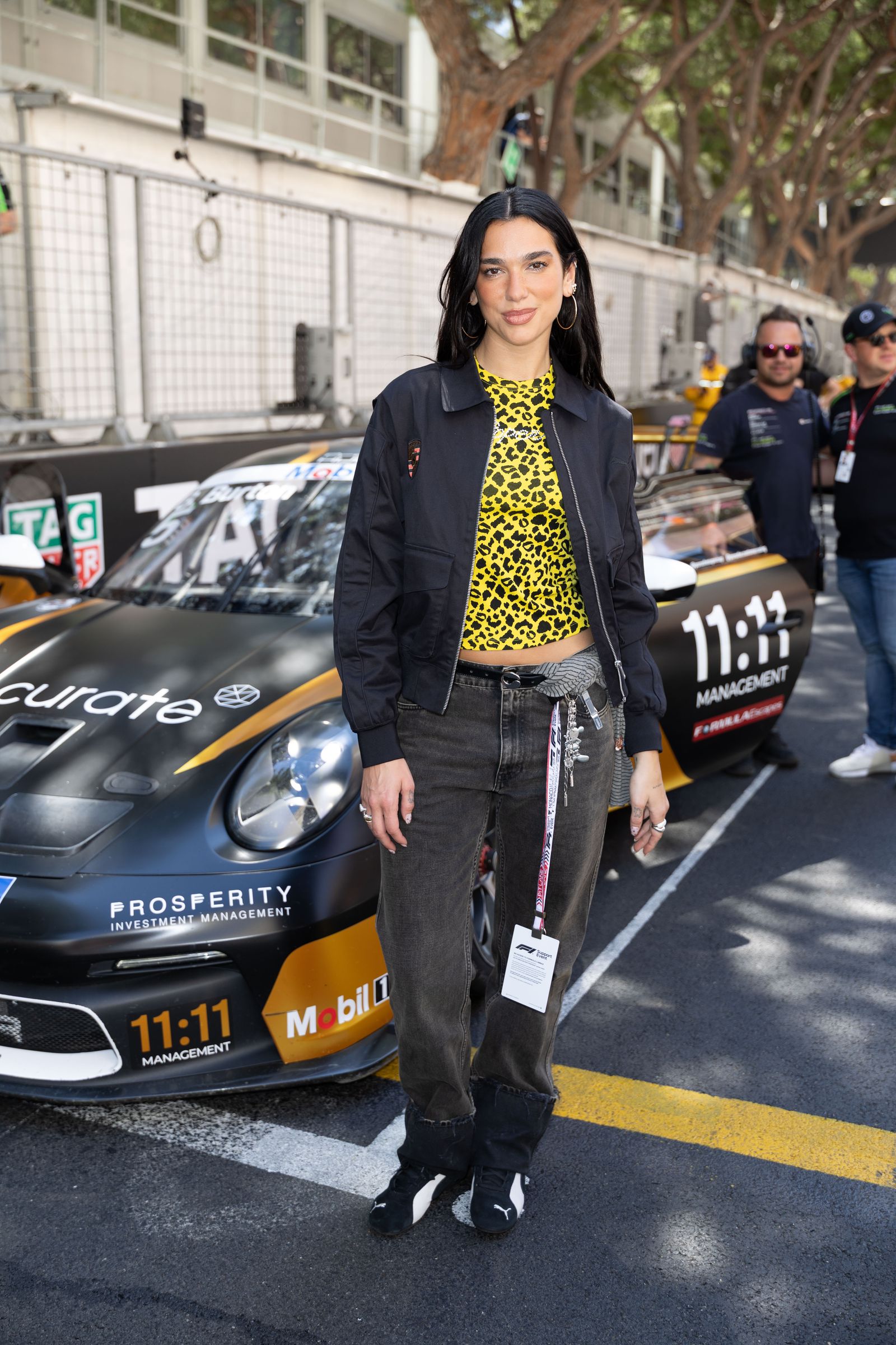 Images may contain Dua Lipa Alexander Kristoff clothing pants jacket shoes standing and adult