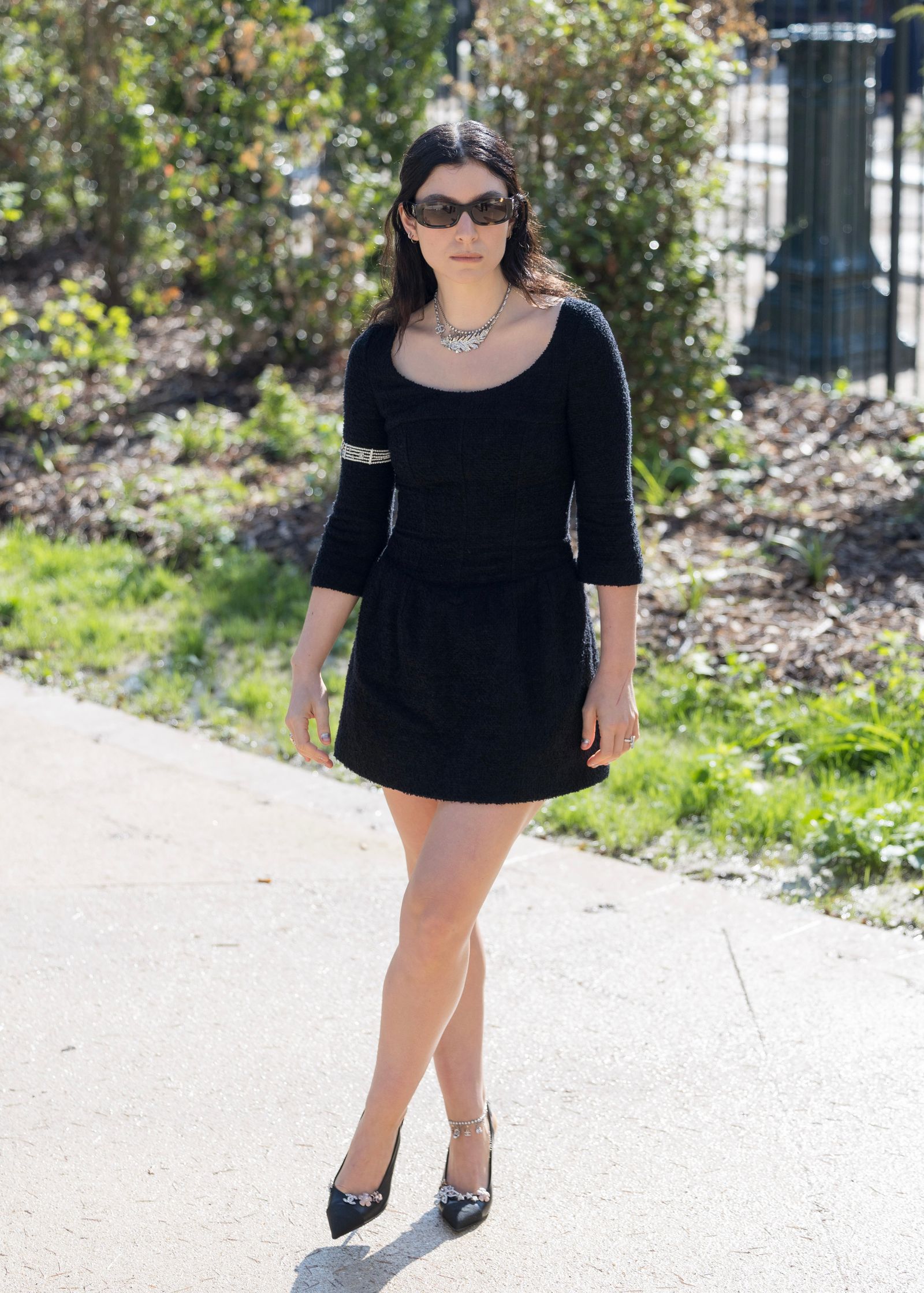 Images may contain Lorde Phorting footwear high heels adult accessories glasses jewelry and necklaces