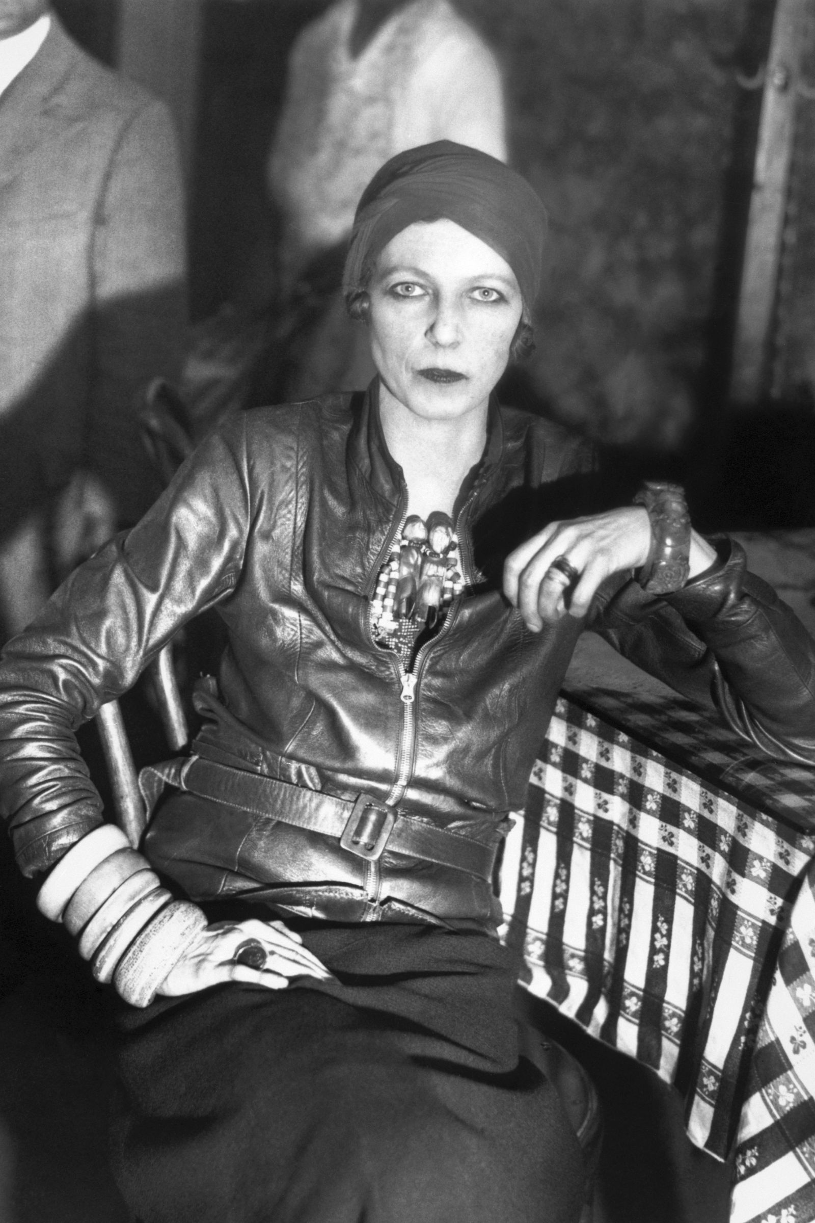 Images may contain Nancy Cunard Clothing Jacket adult facial photography portraits and body parts