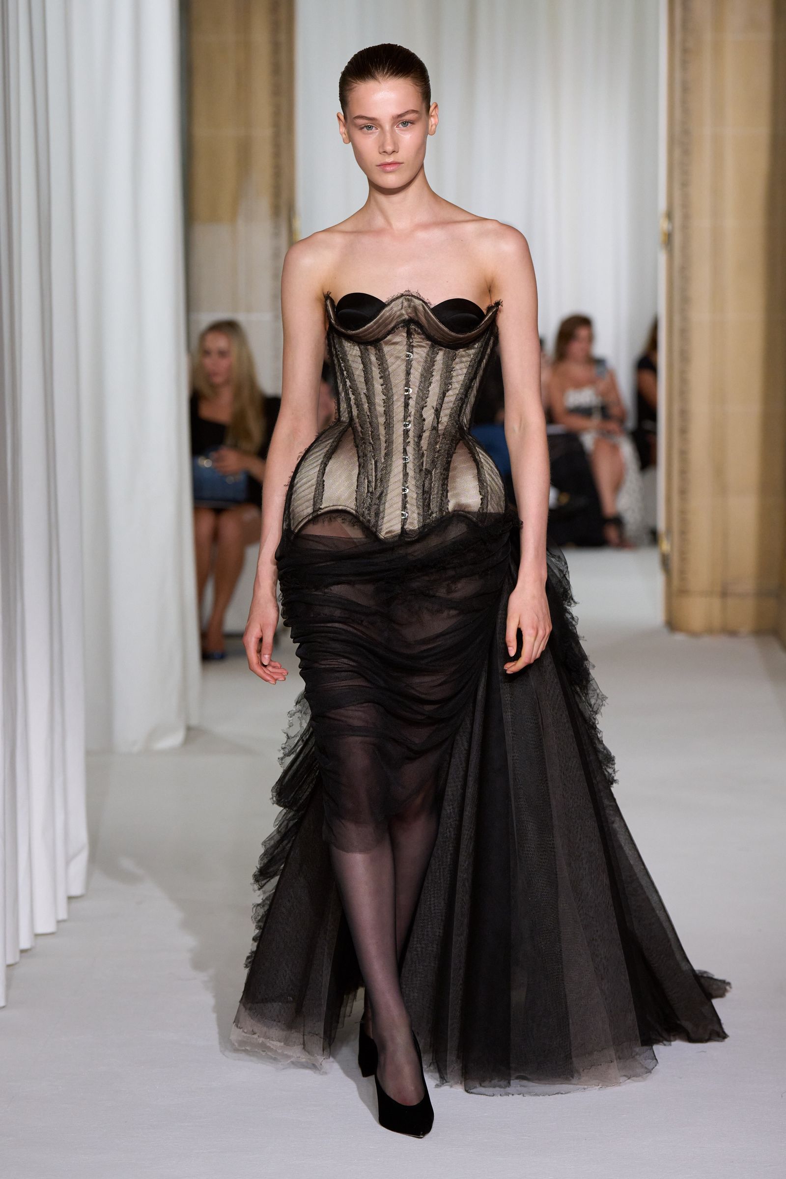 Images may contain stylish adult clothing dress formally wearing footwear heels and runway