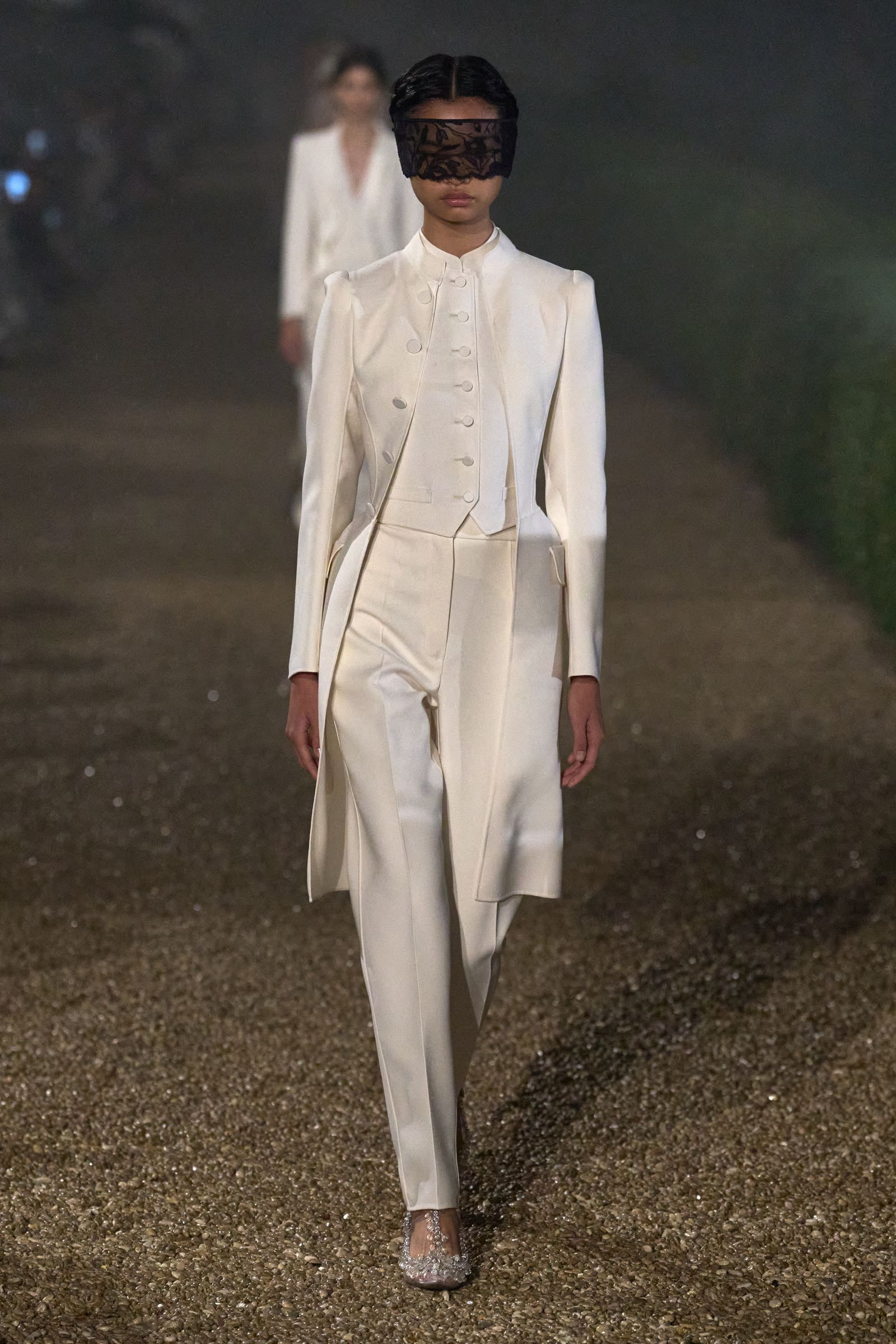 Images may contain clothing, formal suits, adults and standing