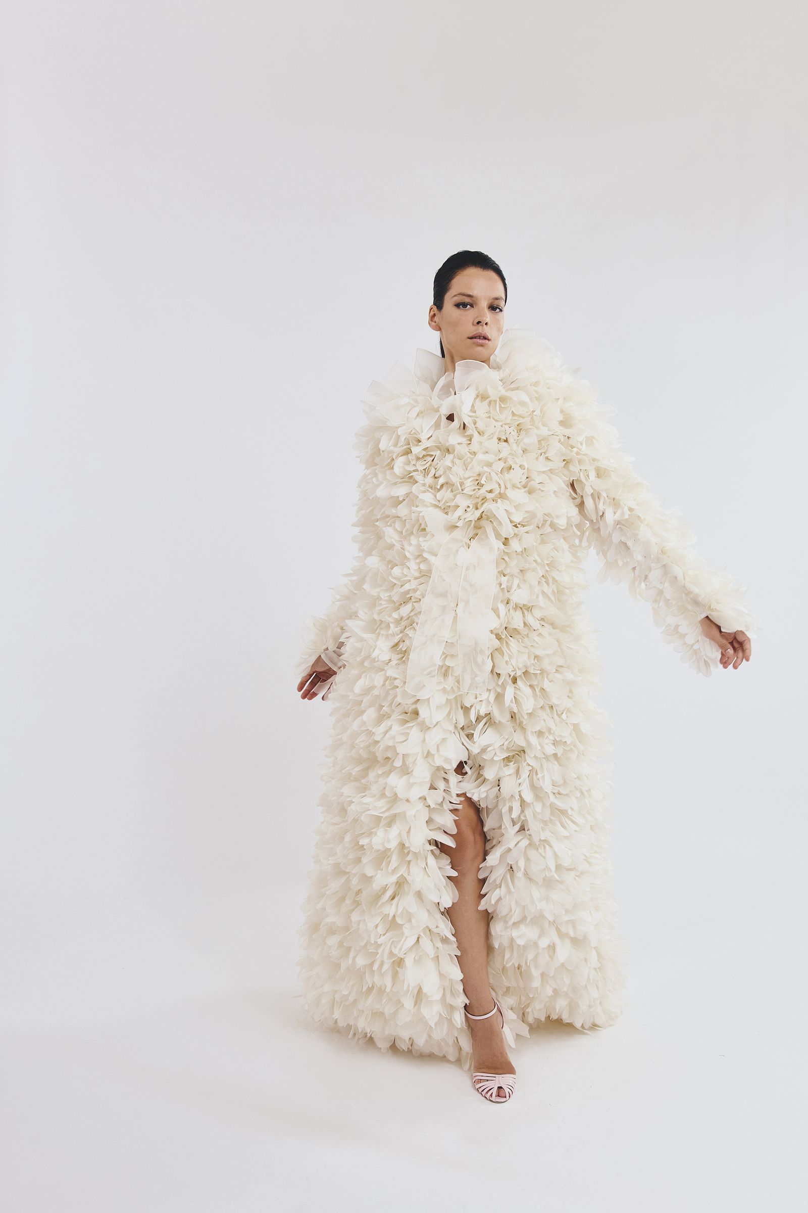 Images may contain clothes long sleeves for adult wedding coat fur and fashion