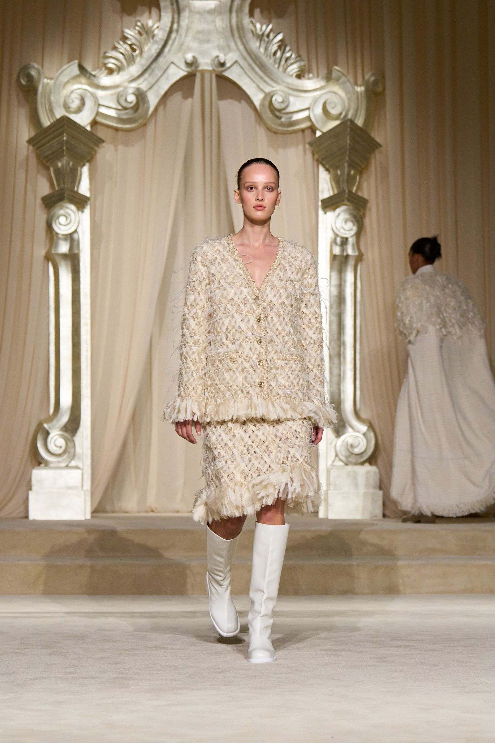 Images may contain Michaela Kocianova adult wedding dresses shoes industry fashion dresses and formal wear