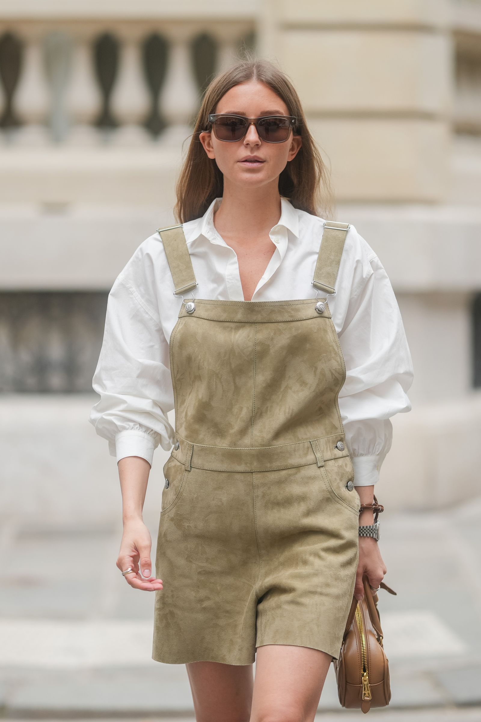 Images may contain personnel accessories handbags and glasses
