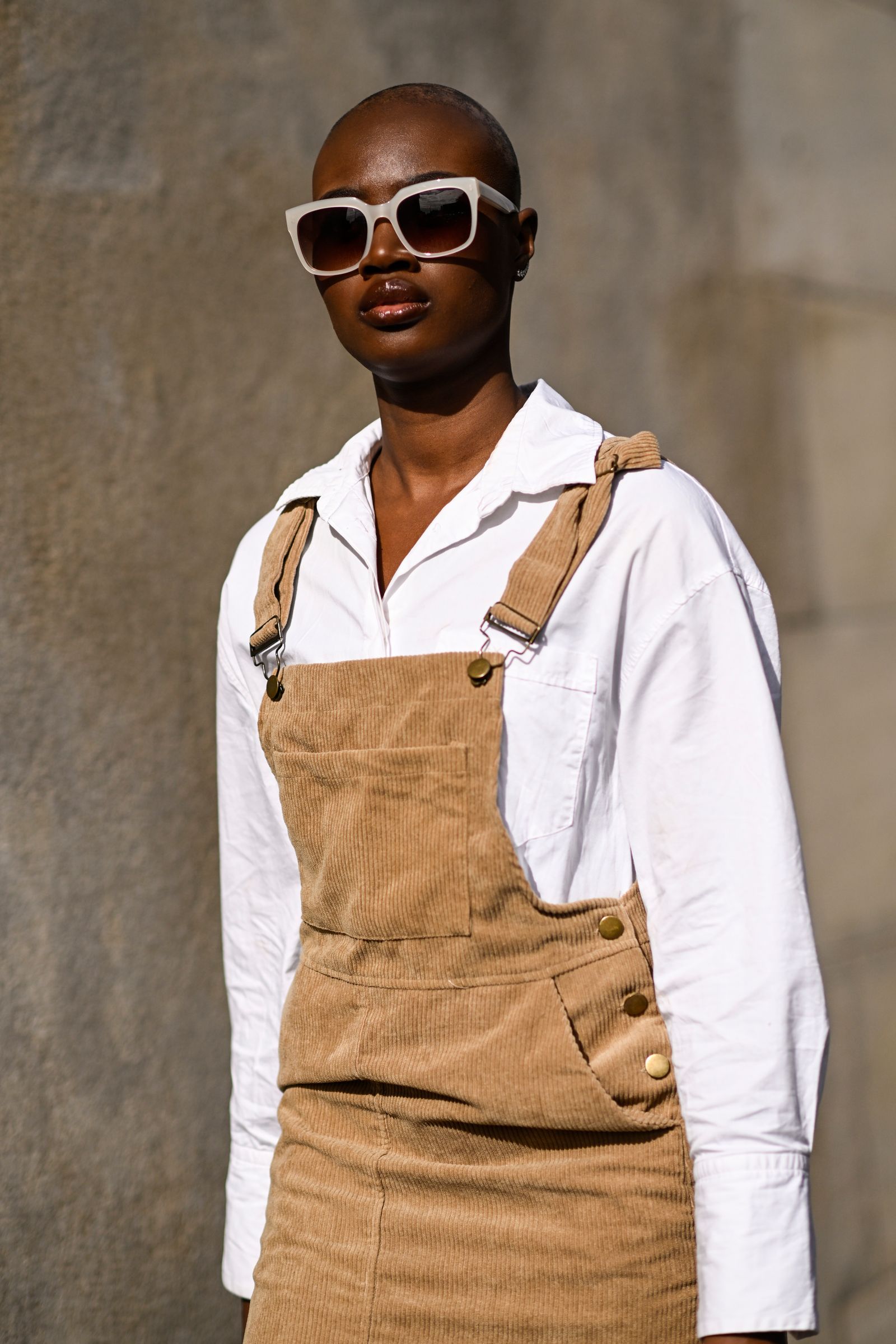 Images may contain accessories for glasses adult clothing and vest