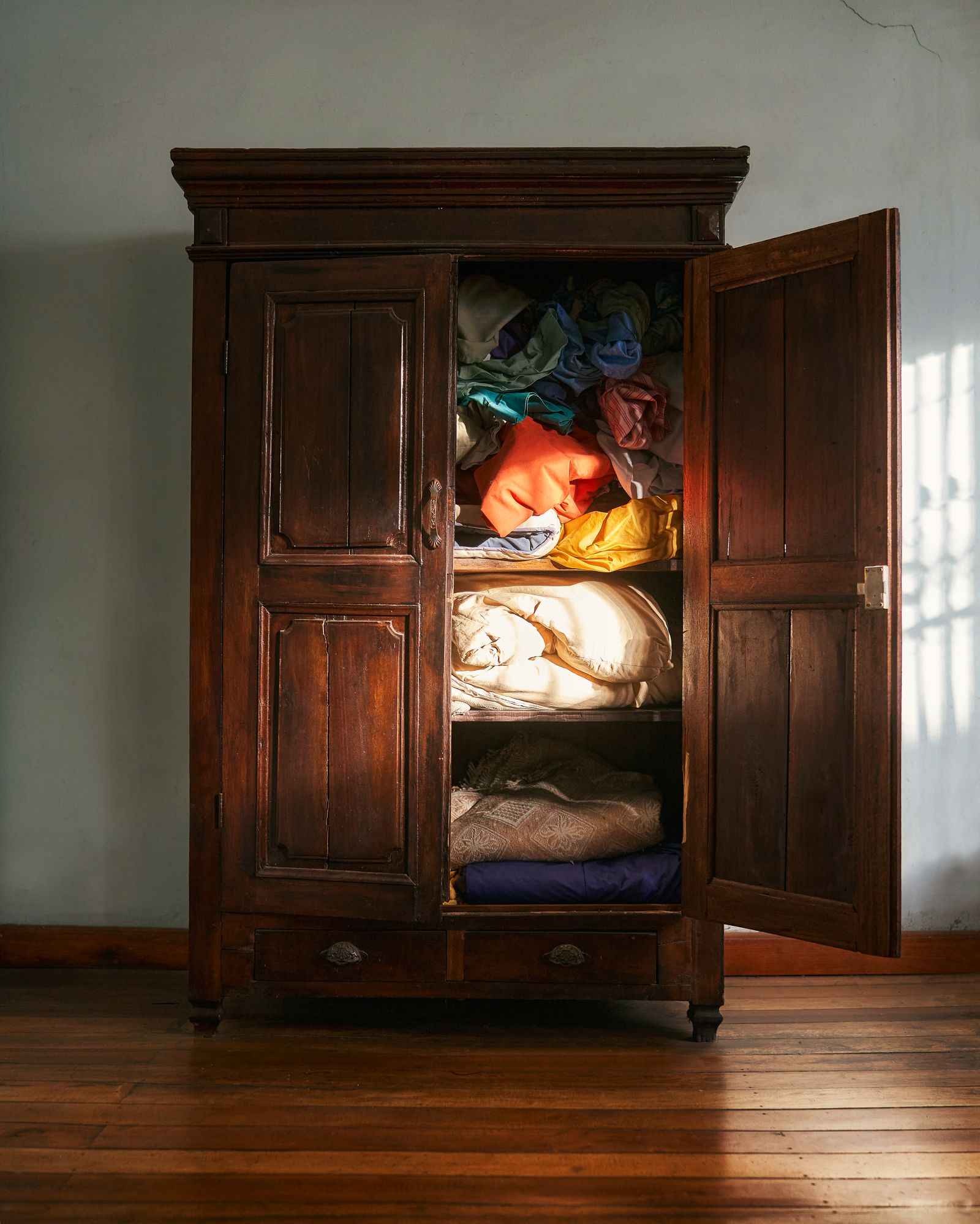 Images may contain cabinet cabinet furniture hardwood and wood