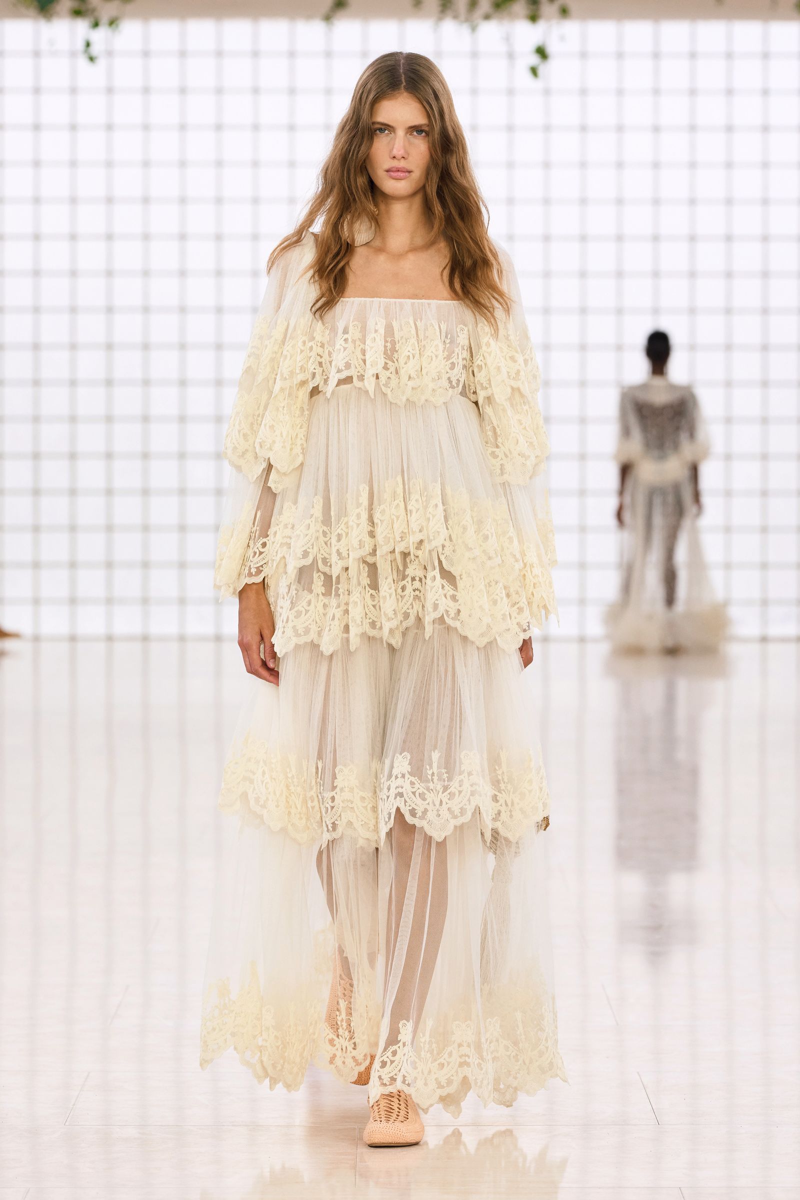 Images may contain Shlomit Malka Clothing Fashion People Formal Dress Wedding Dress Wedding Dresses and Adults