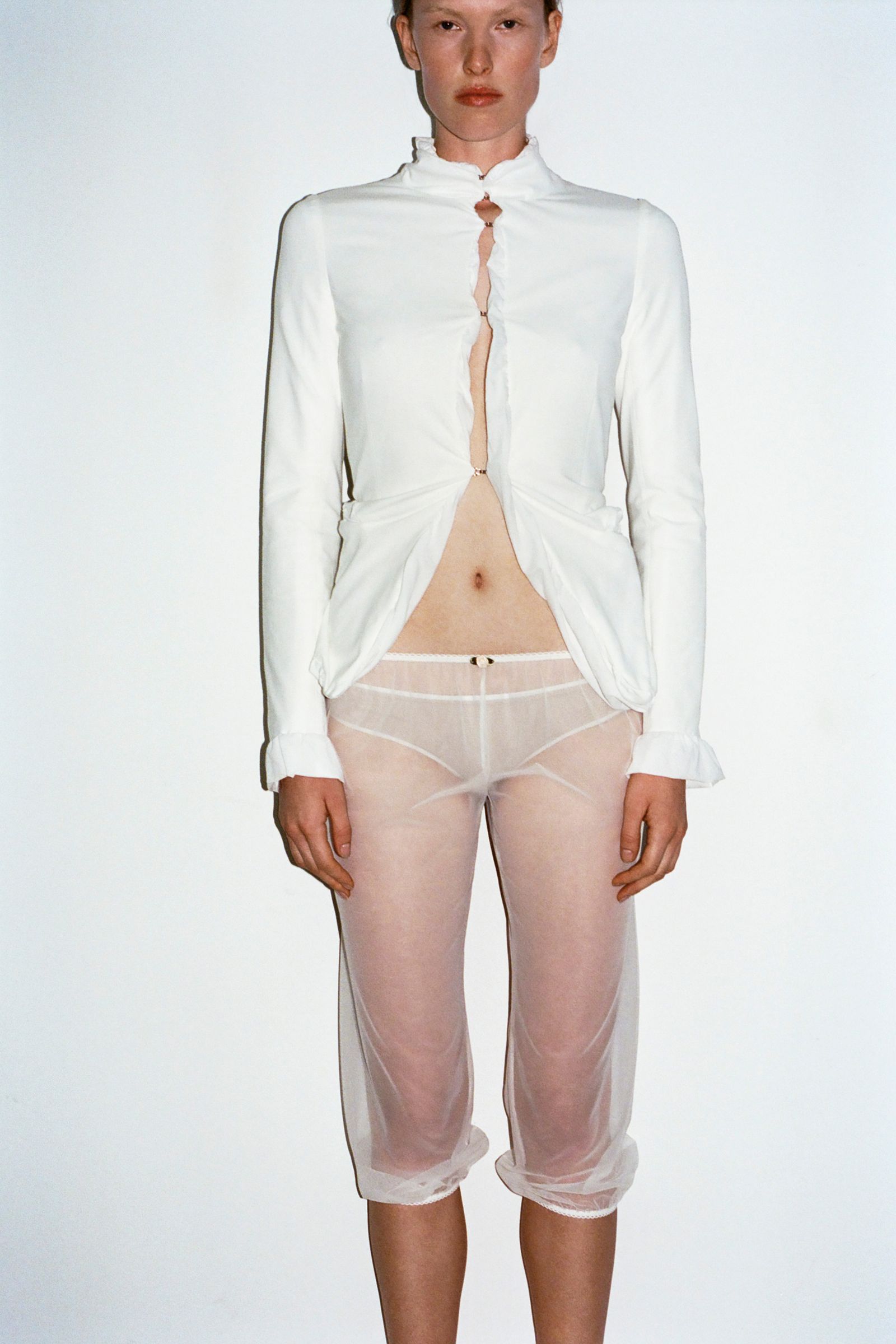 Images may contain clothes with long sleeves for adult underwear and underwear