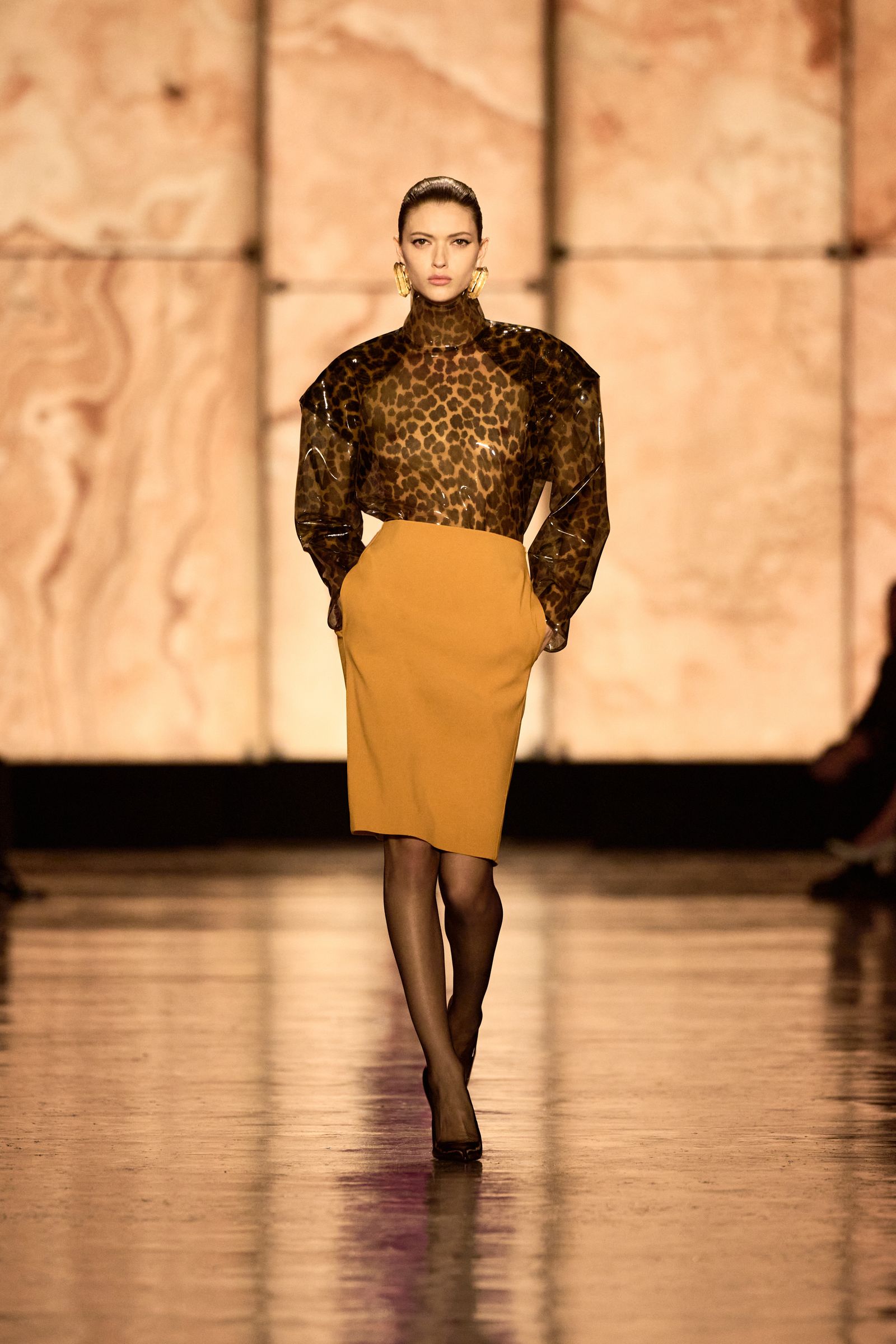 Images may contain stylish adult clothing footwear high heels long sleeves and performers