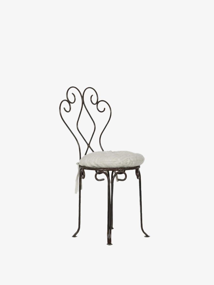 Images may contain: furniture, chairs and tables
