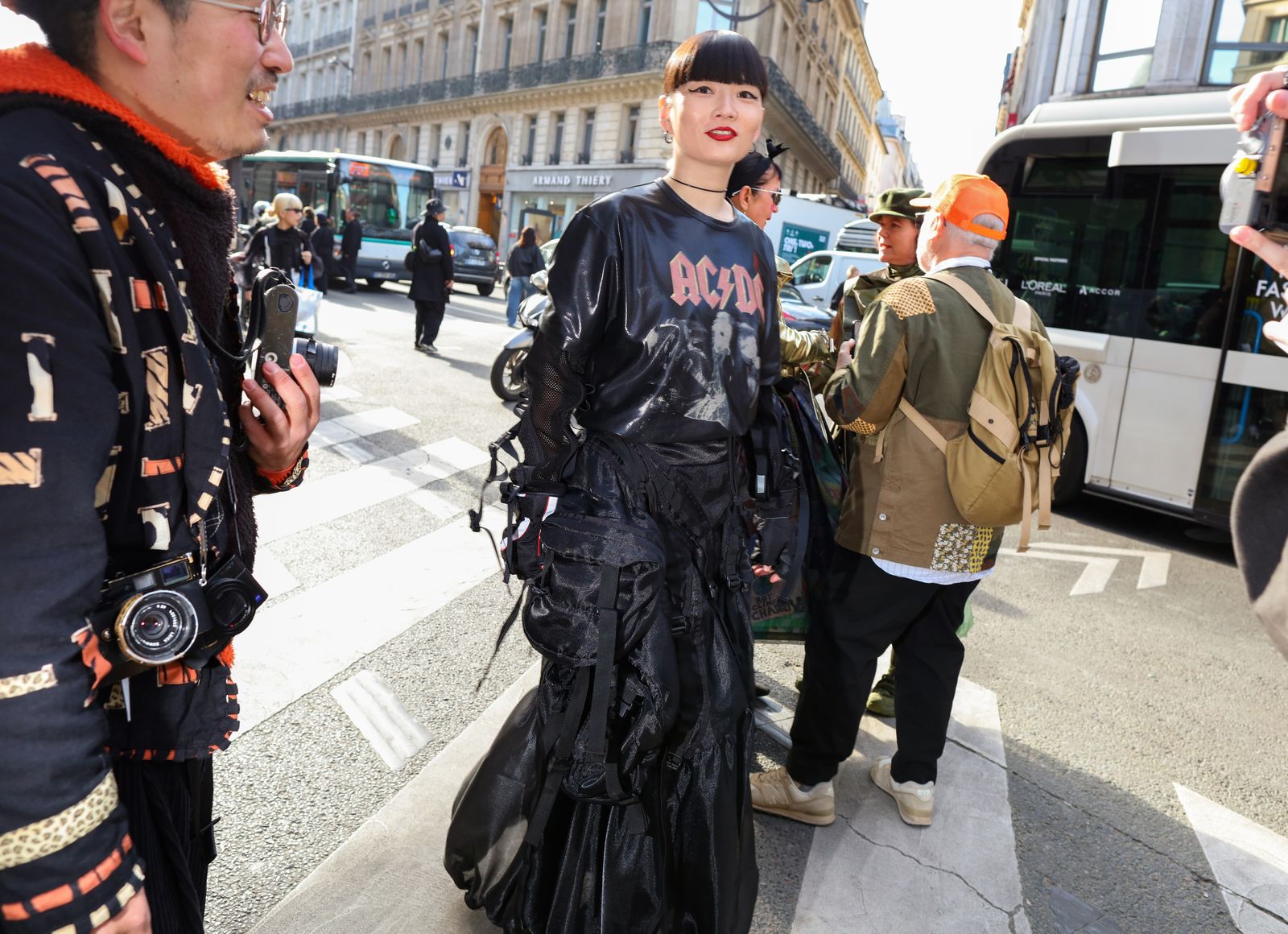 Images may contain Kozue Akimoto Juan Jos Castelli clothing shoes backpack bag jacket and adult