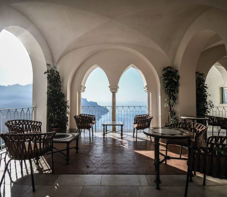 Images may contain plant chair furniture arched building table bottom dining table interior and building