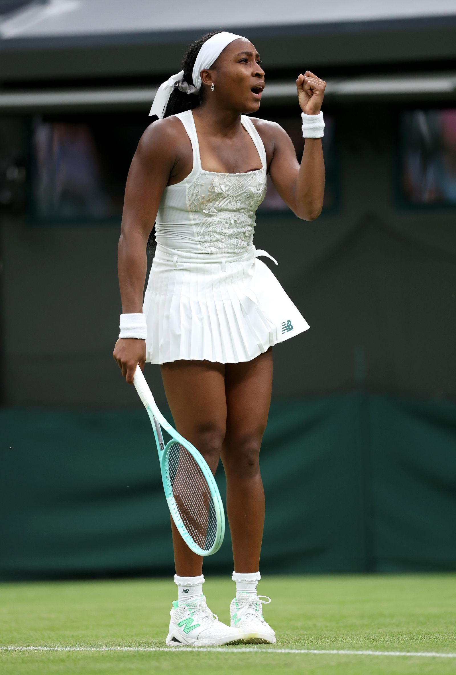 Images may contain Cori Gauff clothing shoes shoes sports tennis tennis racket adults and accessories