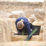 Archaeologists dug out the stone walls of the tomb.