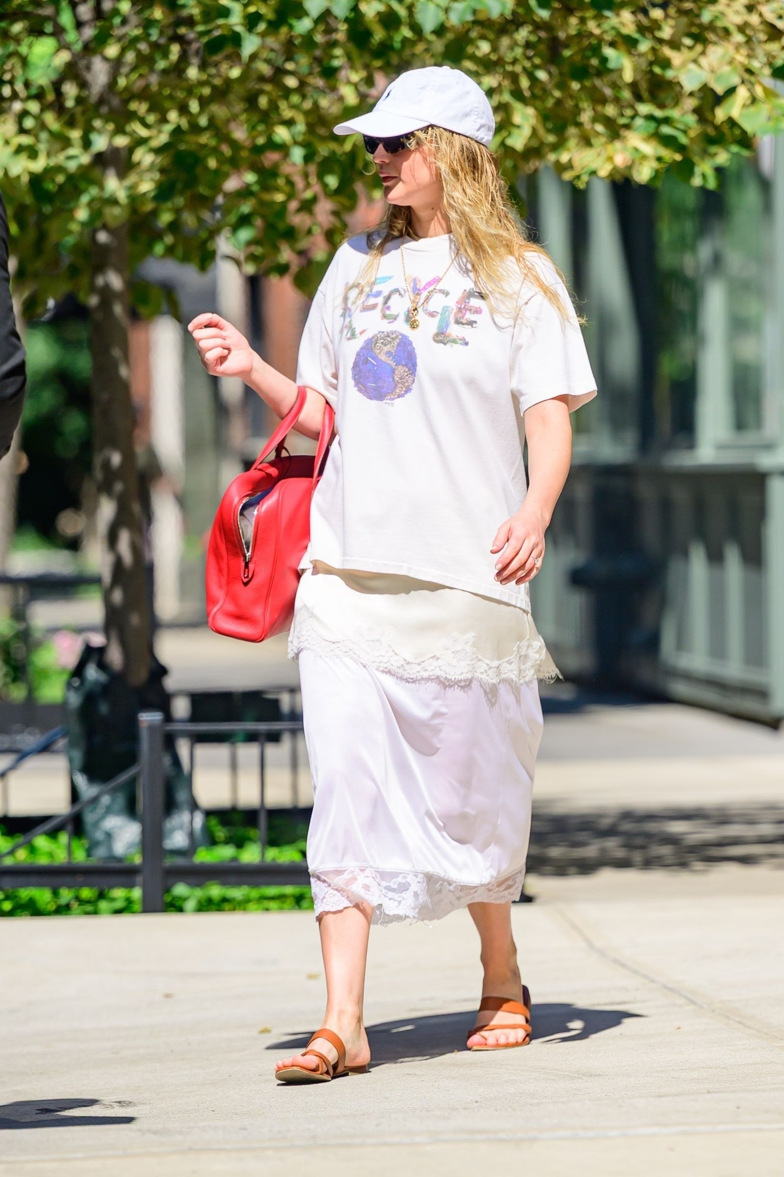Images may contain accessories bags tote bags adult clothing shorts hat glasses shoes sandals and jewelry