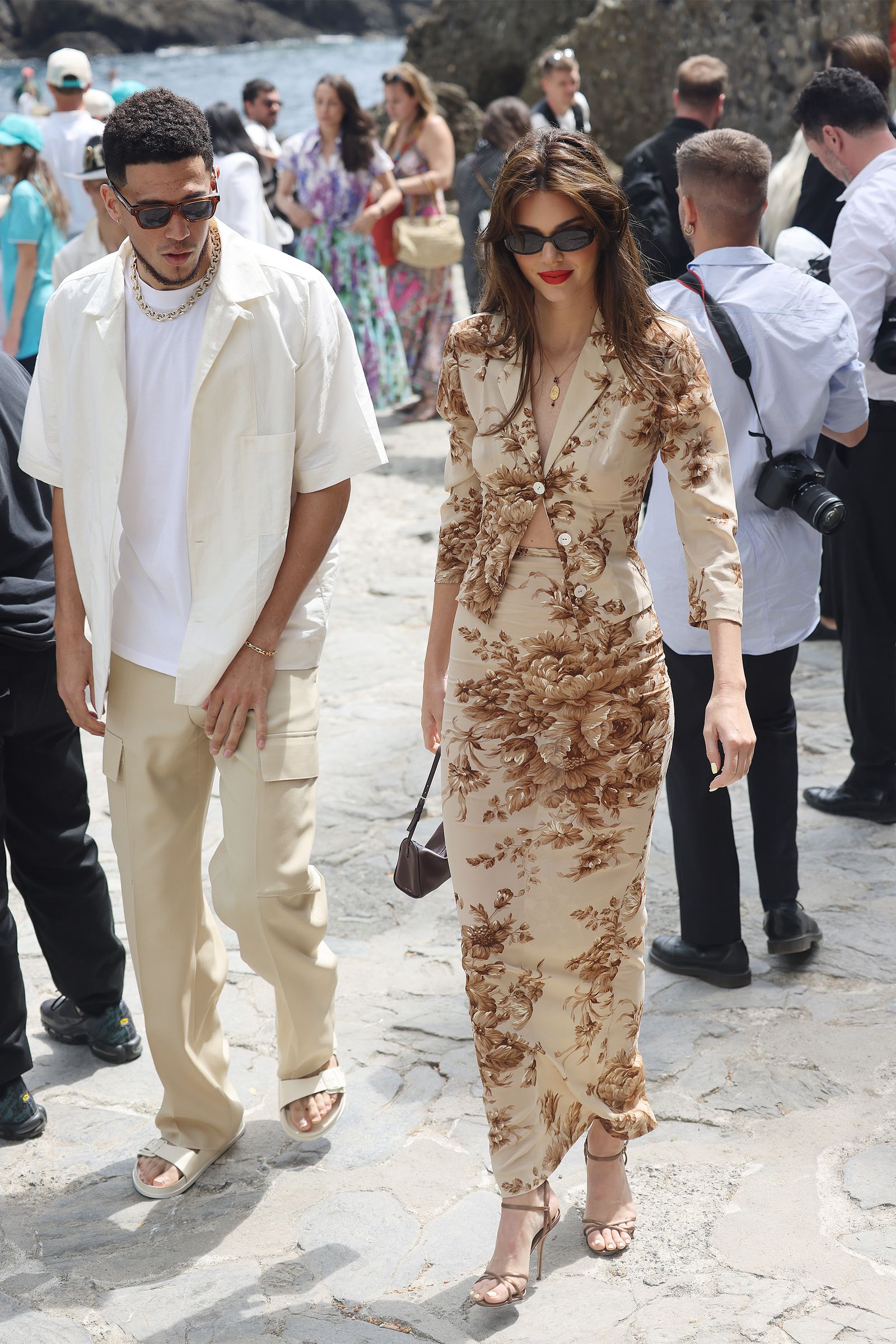 Images may contain Devin Armani Booker Kendall Jenner Tracy Caulkins Bear Pascoe Camera Electronics and Clothes