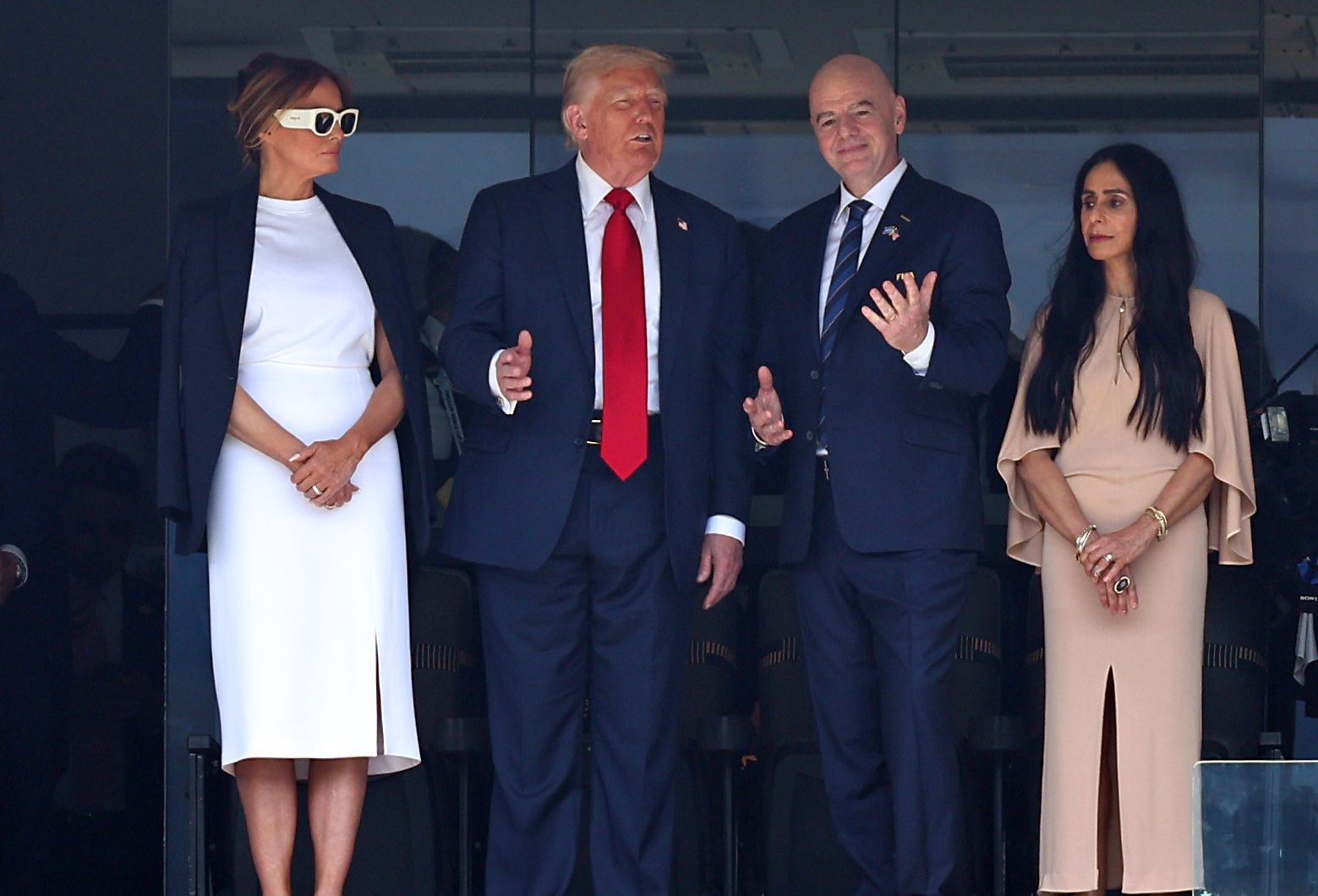 Images may contain Gianni Infantino Donald Trump Accessories Formal Tie Adult Glasses and Bracelets