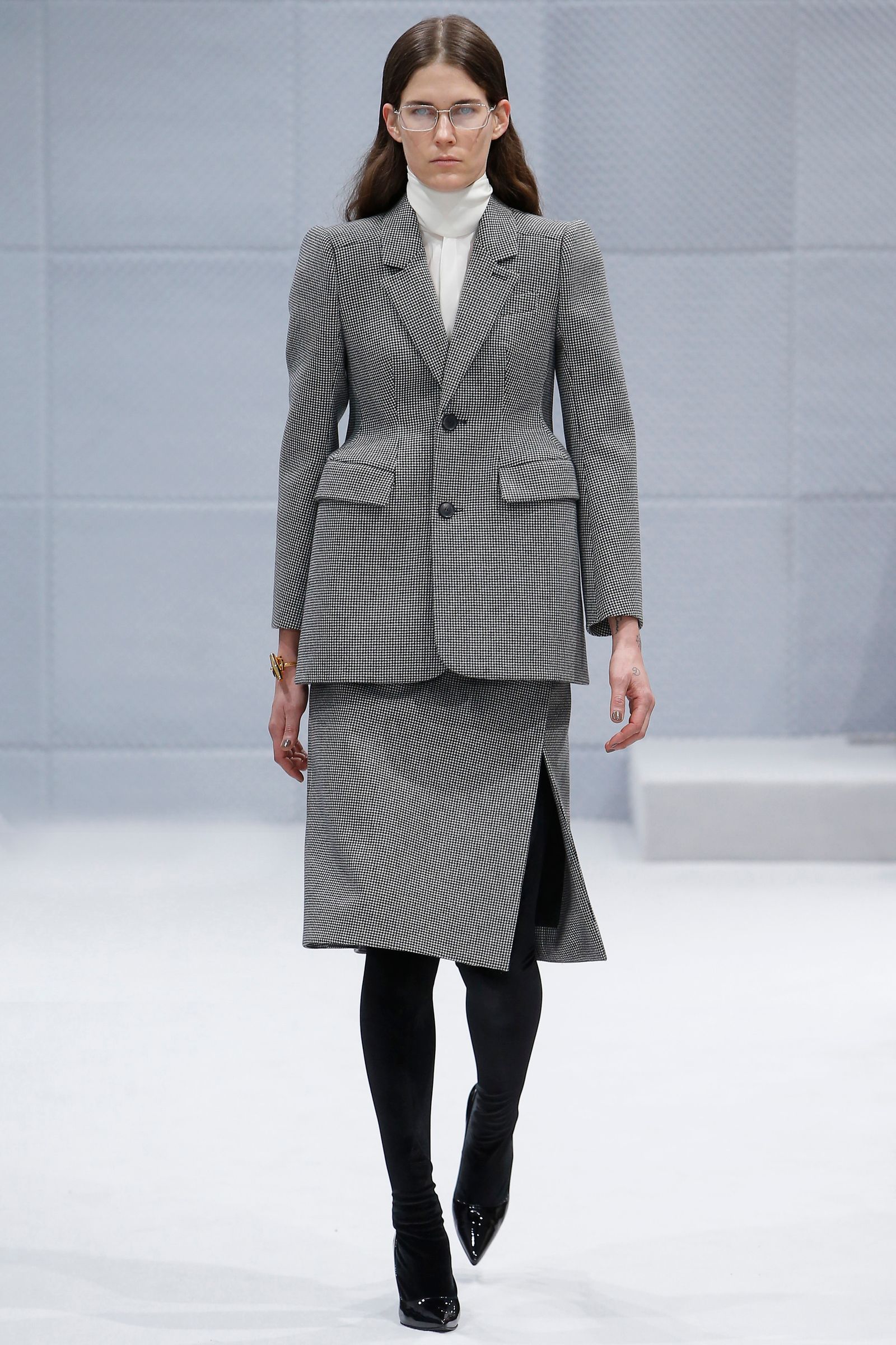 This image may contain human runway fashion clothing footwear clothing and shoes