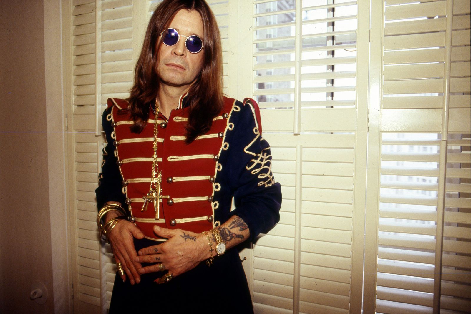 Images may contain Ozzy Osbourne tops, long-sleeved jackets, adult clothing and blazers
