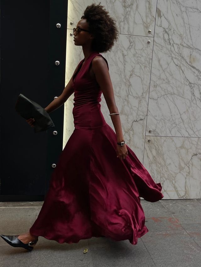 Images may contain clothing dress formally wearing watch fashion dress evening dress adult and wedding