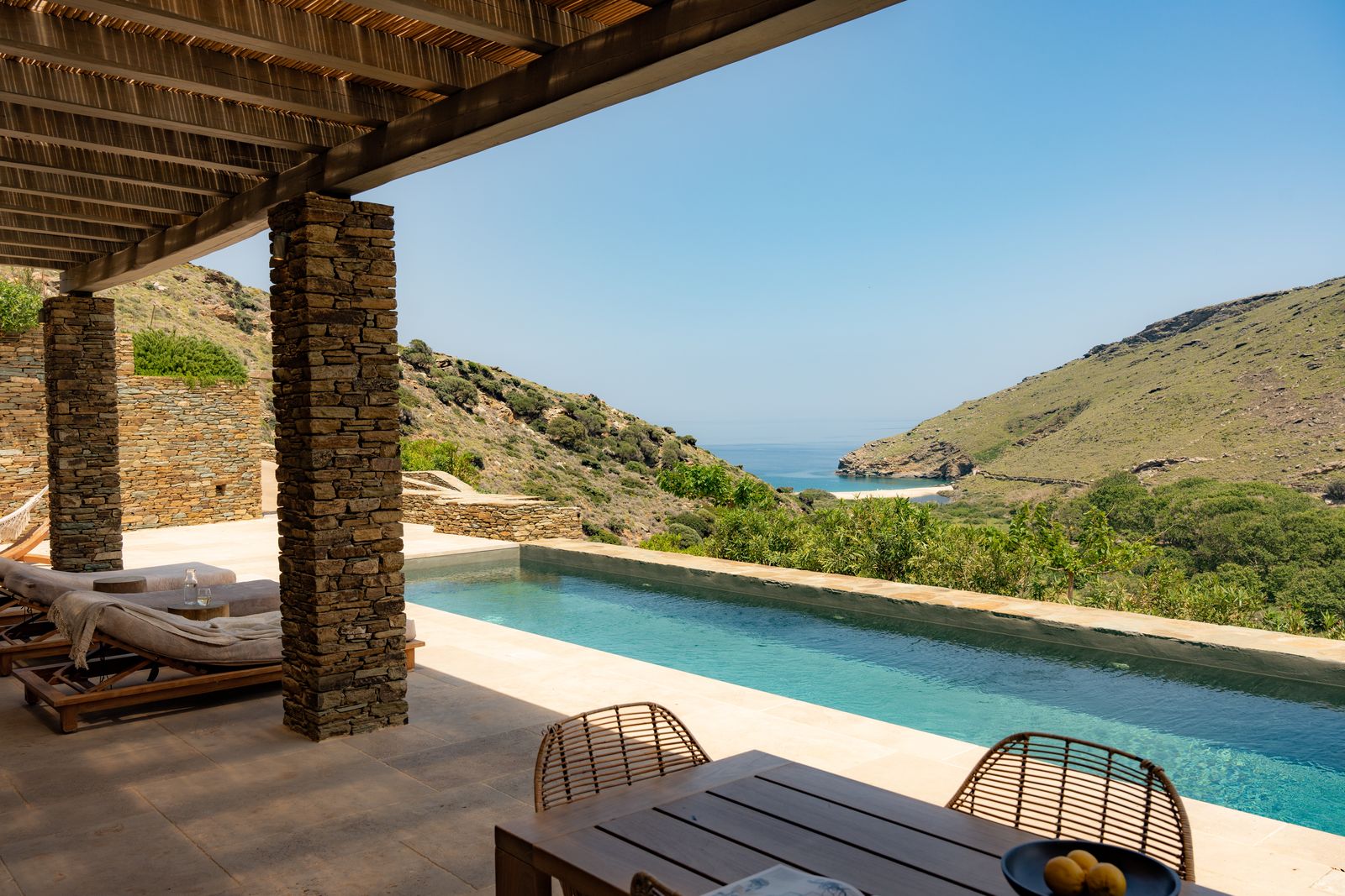 Images may contain architectural houses houses houses pool water chairs furniture swimming pool and outdoor