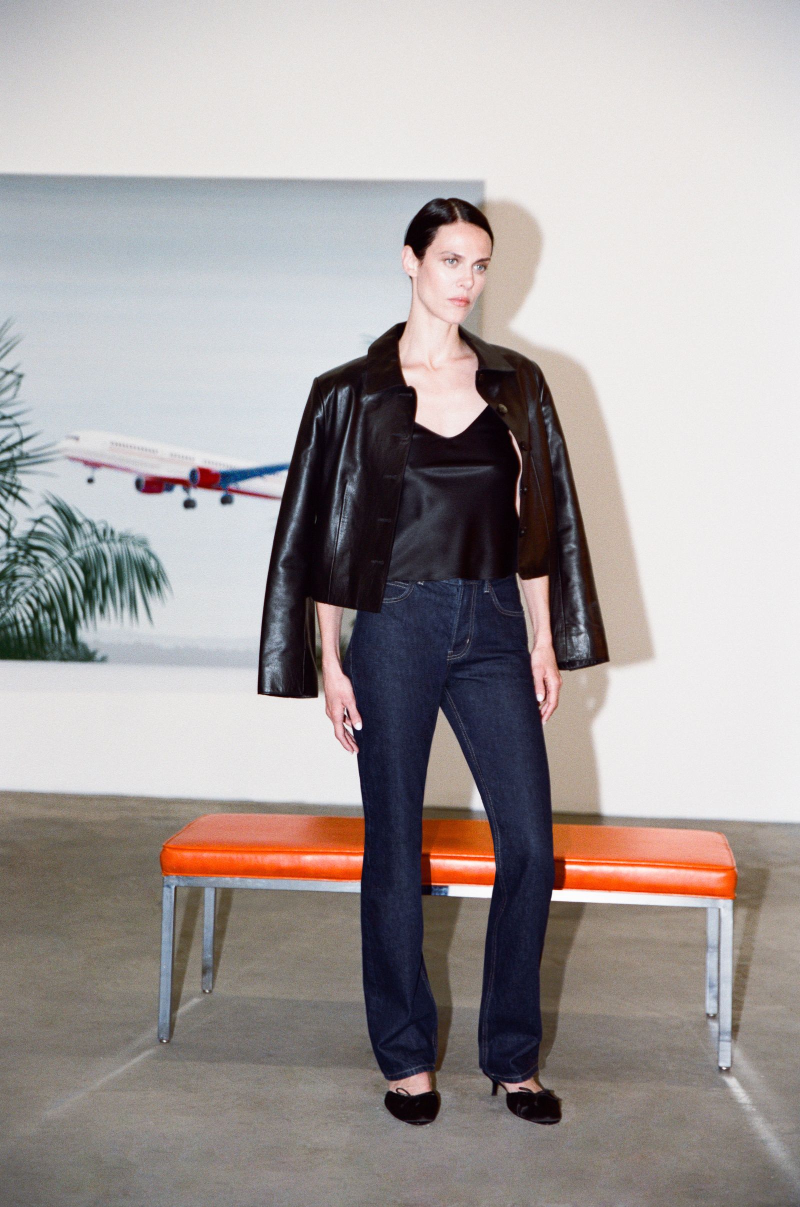 Images may contain Aymeline Valade Clothing Blazer Pants Pants Blazer Adult Shoes High Heels and Shoes