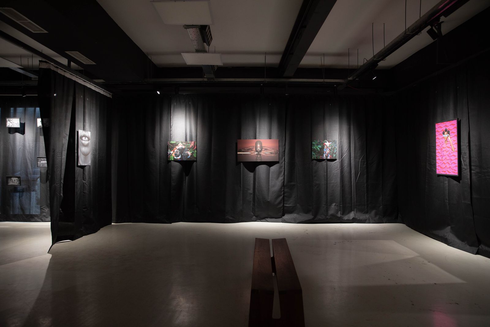 Images may contain lighting stage floor indoor electronic screen room and studio