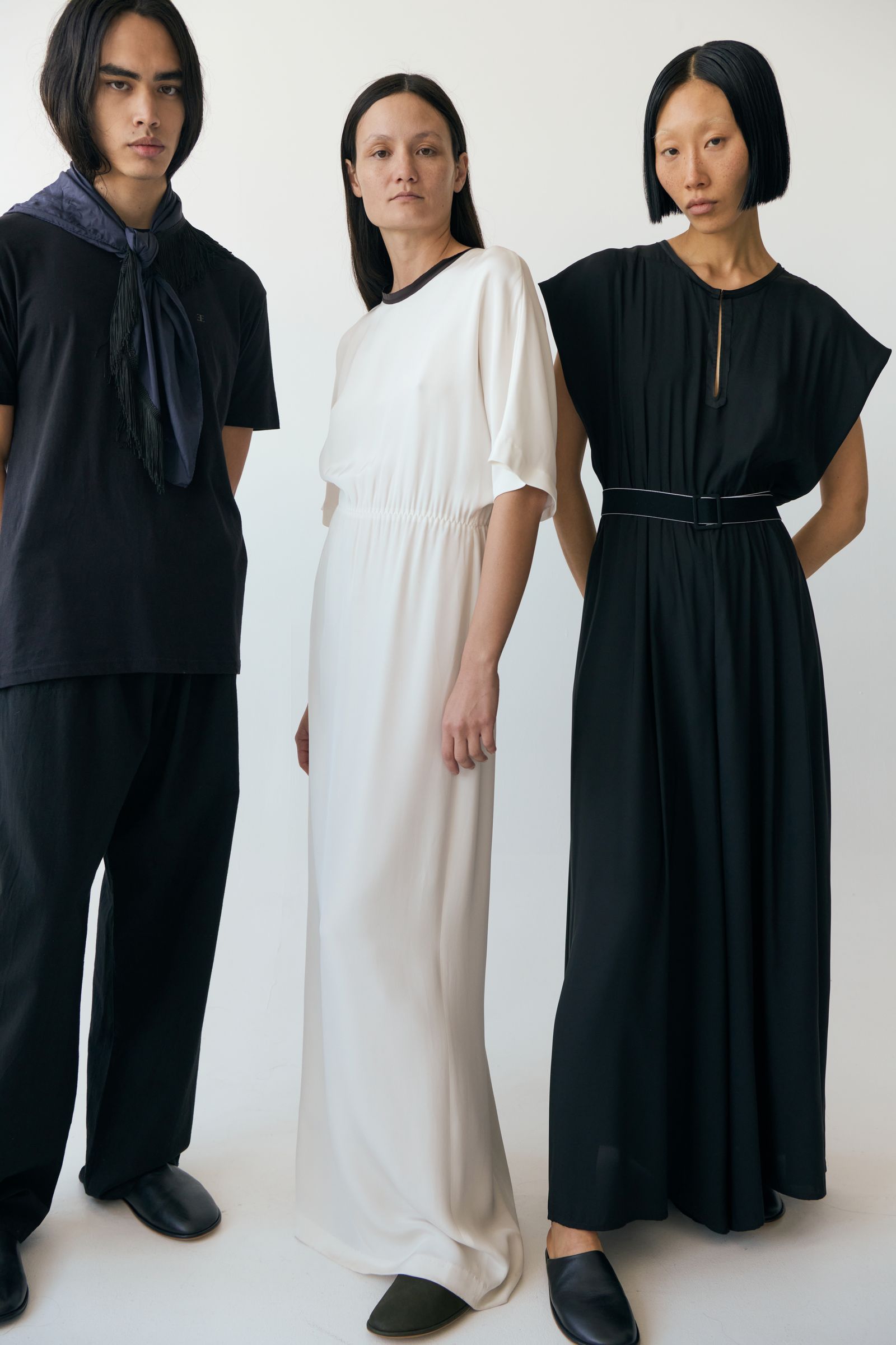 Images may contain adult fashion clothing scarf dress and people