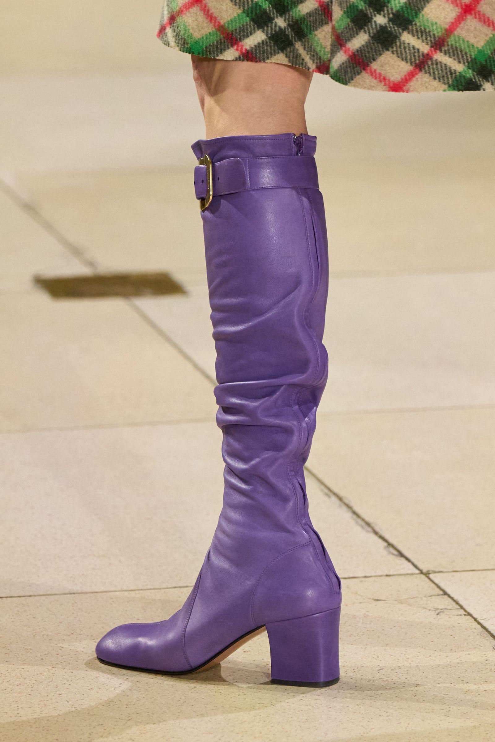 Images may contain clothing shoes, high heels, boots and cycling boots