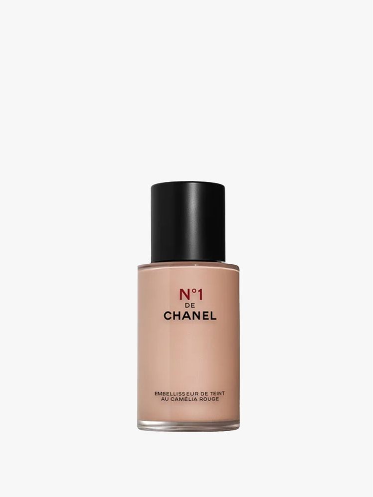 Image may contain: Cosmetics, Bottle, Perfume, Face, Head, and Person