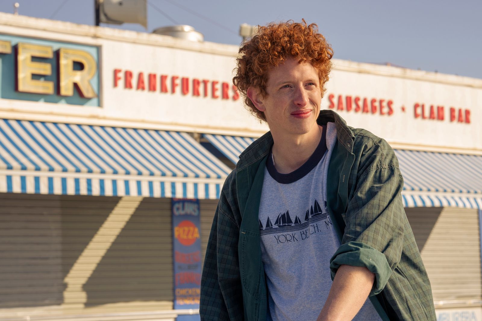 Images may contain caradog W. James man teen blonde face photography portrait and curly hair