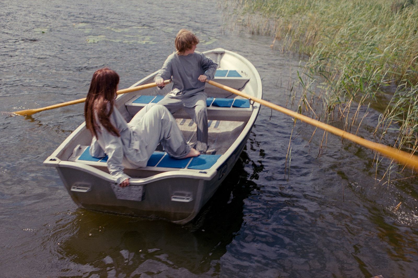 Images may contain ship transporter children adult adult small rubber boat canoeing and canoeing