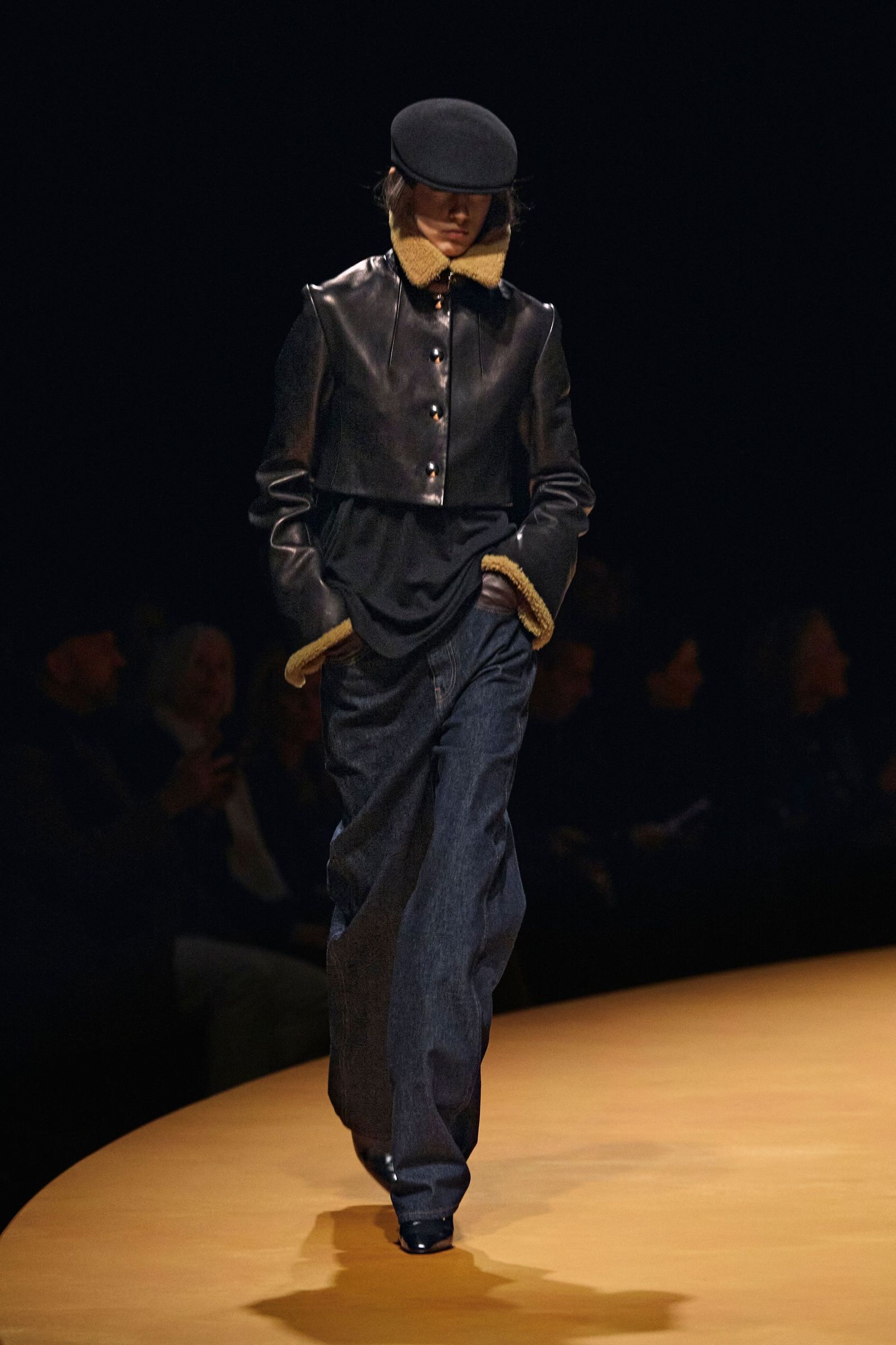 Images may contain fashionable adult clothing shoes shoes hat long sleeves and performers