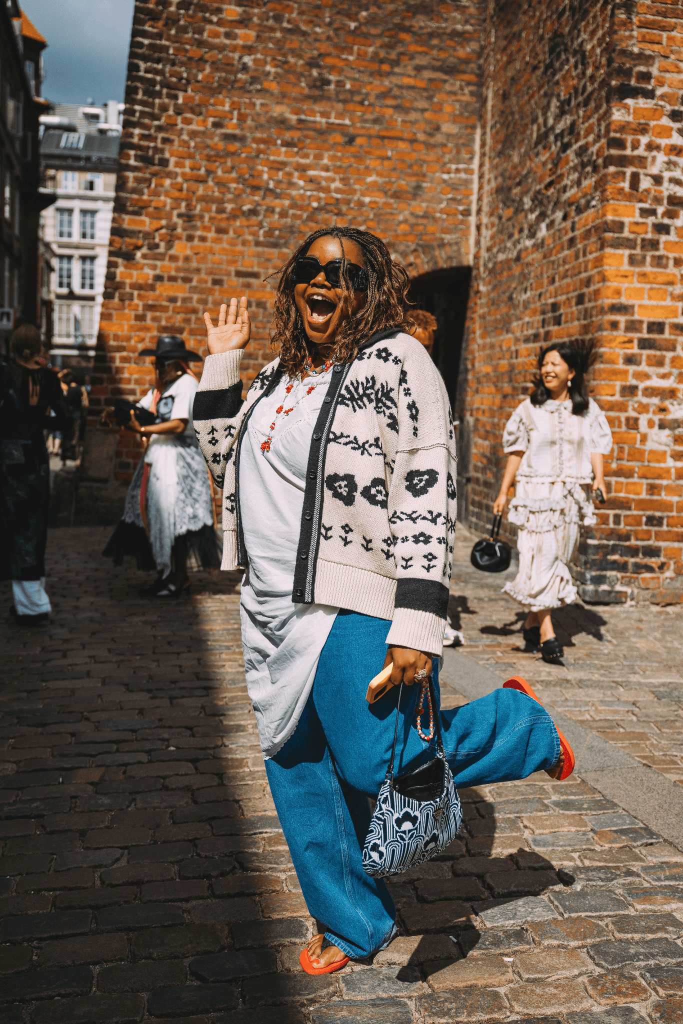 Images may contain Sanmao Path Clothing Pants Brick Face Head Person Photoghoty Portrait Happy Smiling and Adult