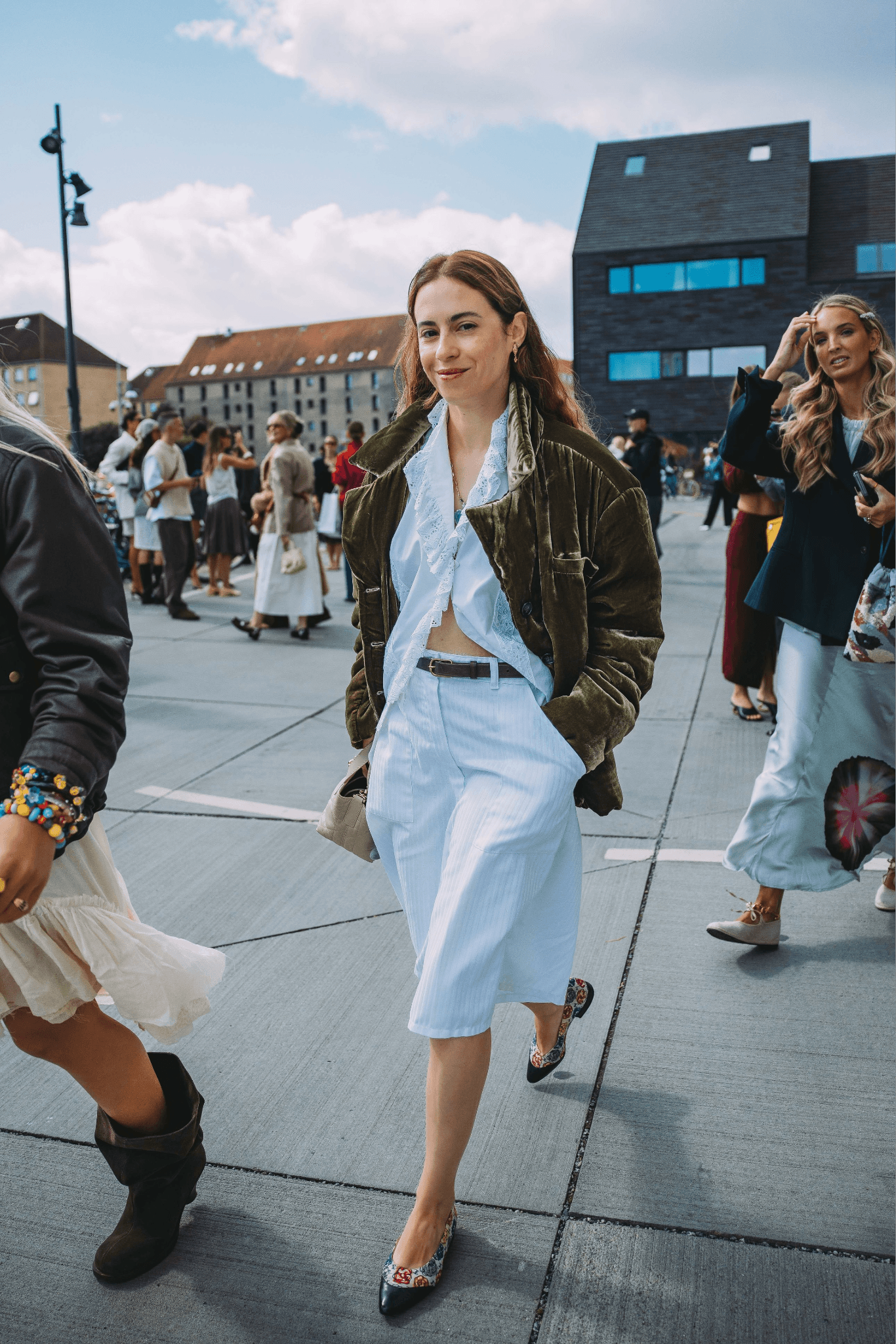 Images may contain Daniela Escobar Dontrelle Inman Pedestrian Clothing Blazer Walking Shoes and Shoes