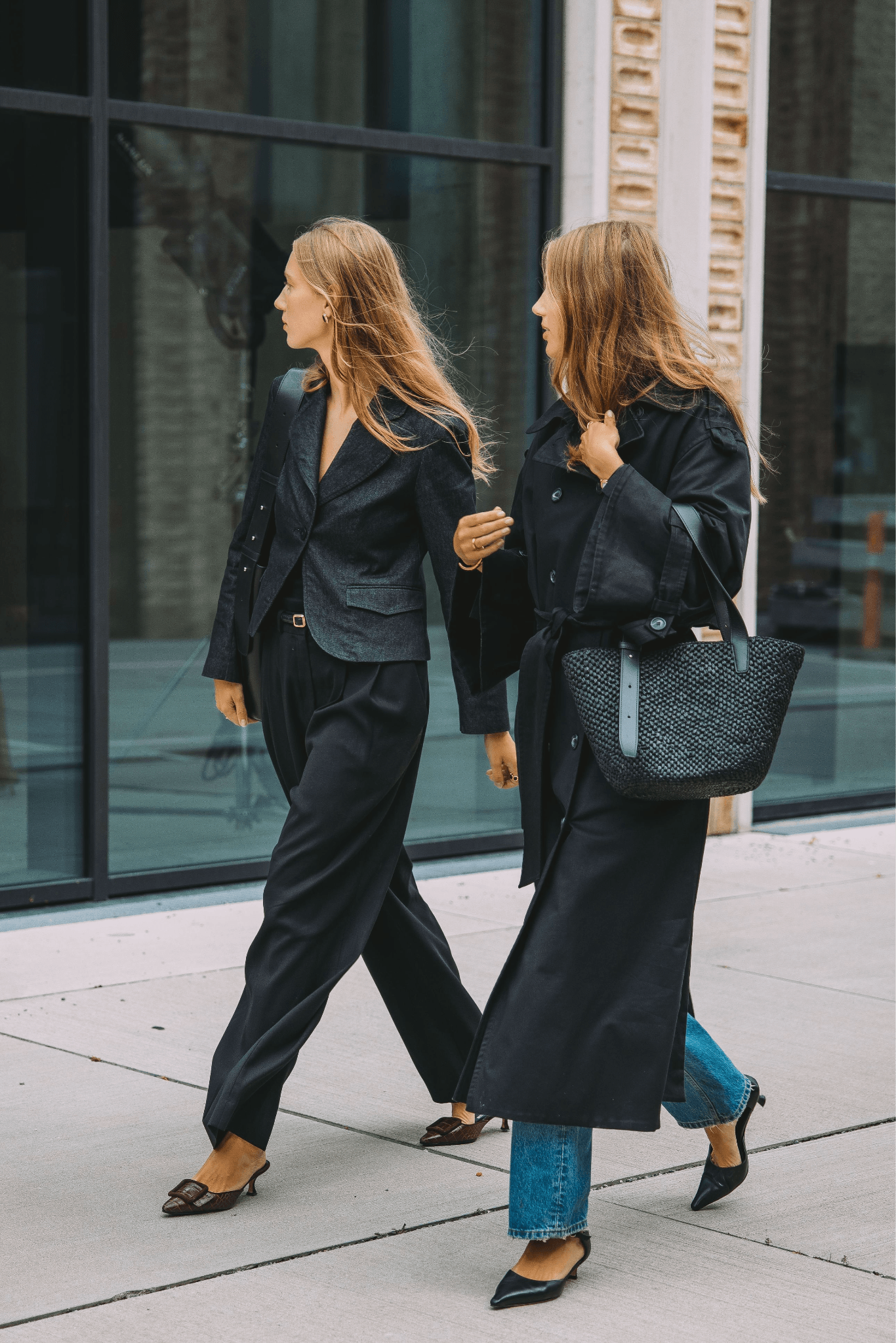 Images may contain pedestrian adult clothing pants shoes shoes walking and coat