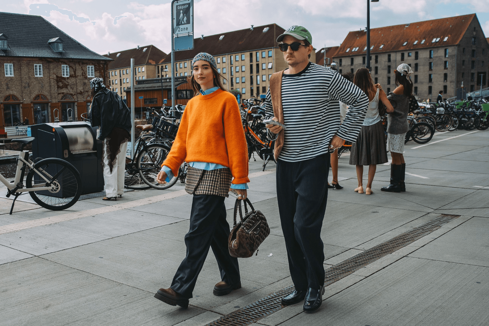 Images may contain Haley Bennett City Street City Clothing Pants Adult Accessories Bags and Handbags