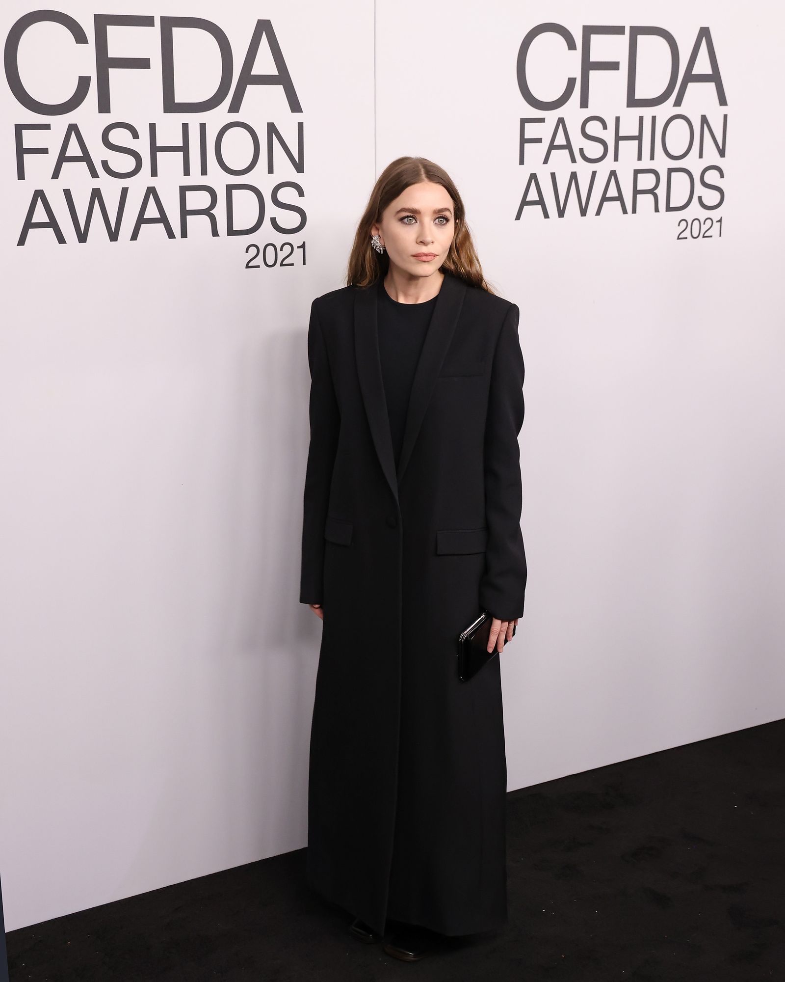 Images may contain Ashley Olsen Clothing Jacket Long Sleeve Coat and Fashion
