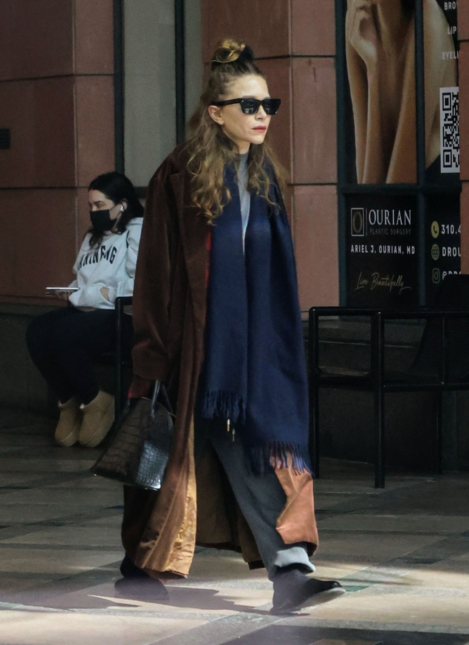 Images may contain Marykate Olsen Clothing Jacket Fashion Accessories Tote Bag Handbag Men Teen Shoes and Shoes