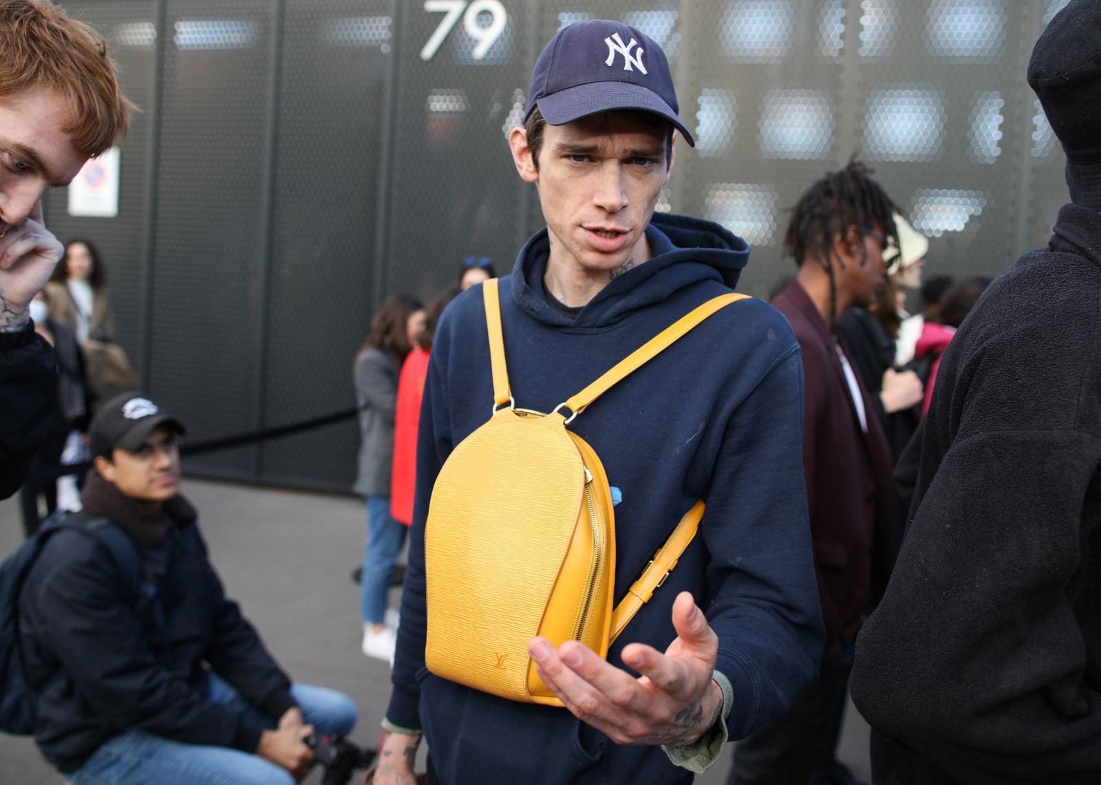 Images may contain a man-made clothing jacket and hat