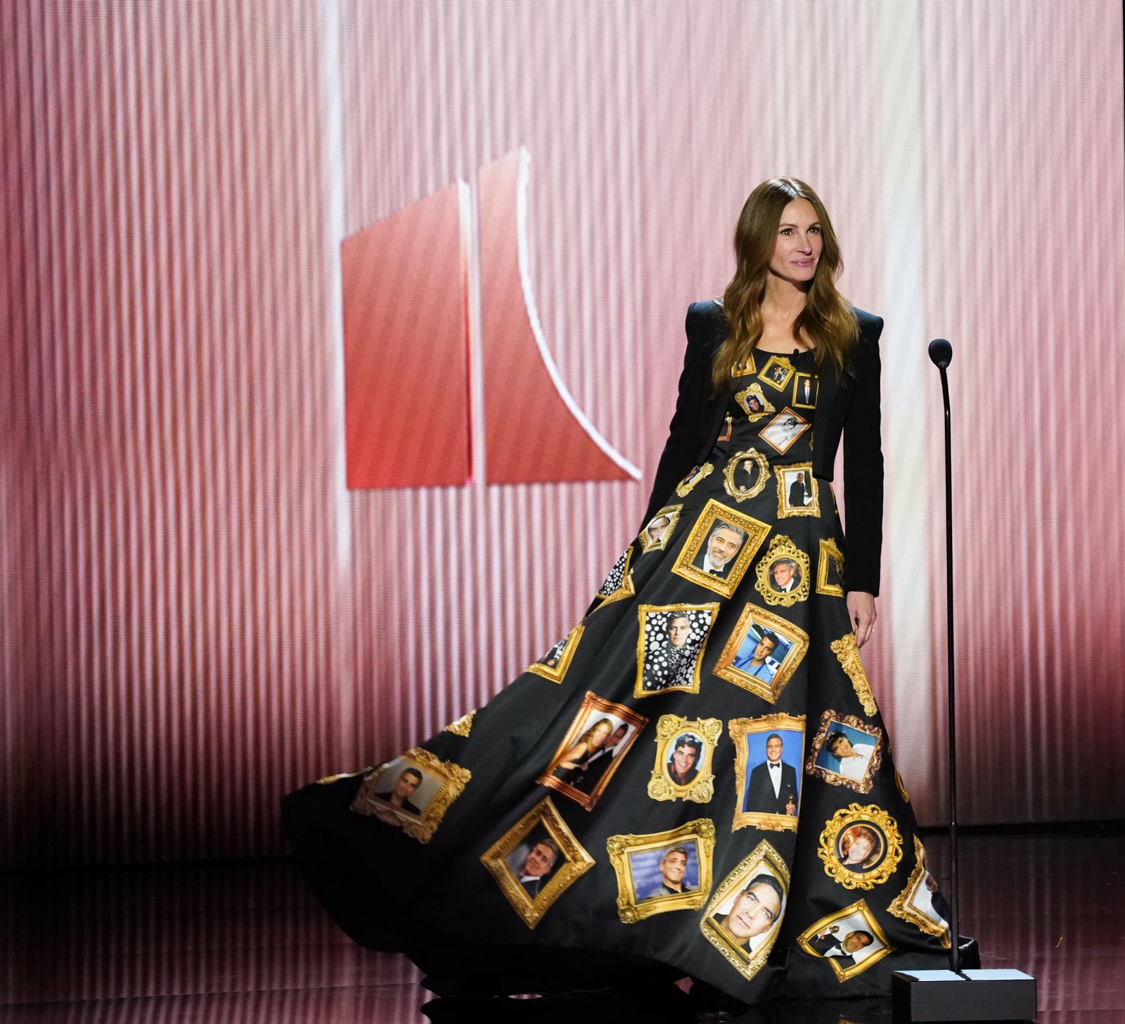 Images may contain Julia Roberts George Clooney performer solo costumes and adults