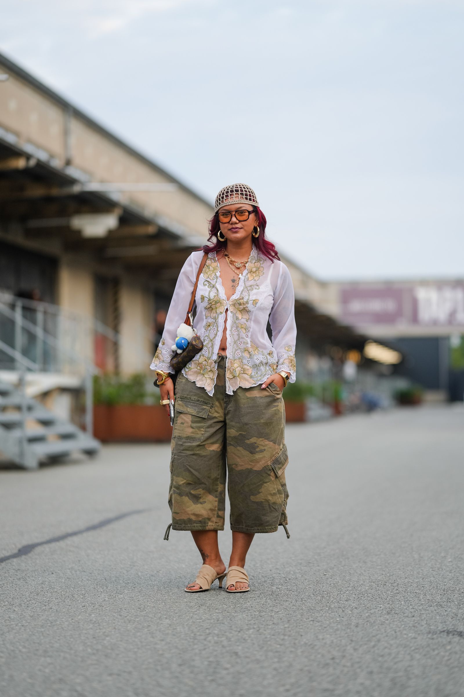 Images may contain clothes, pants, shorts, sandals, adult high heels accessories, glasses and bags