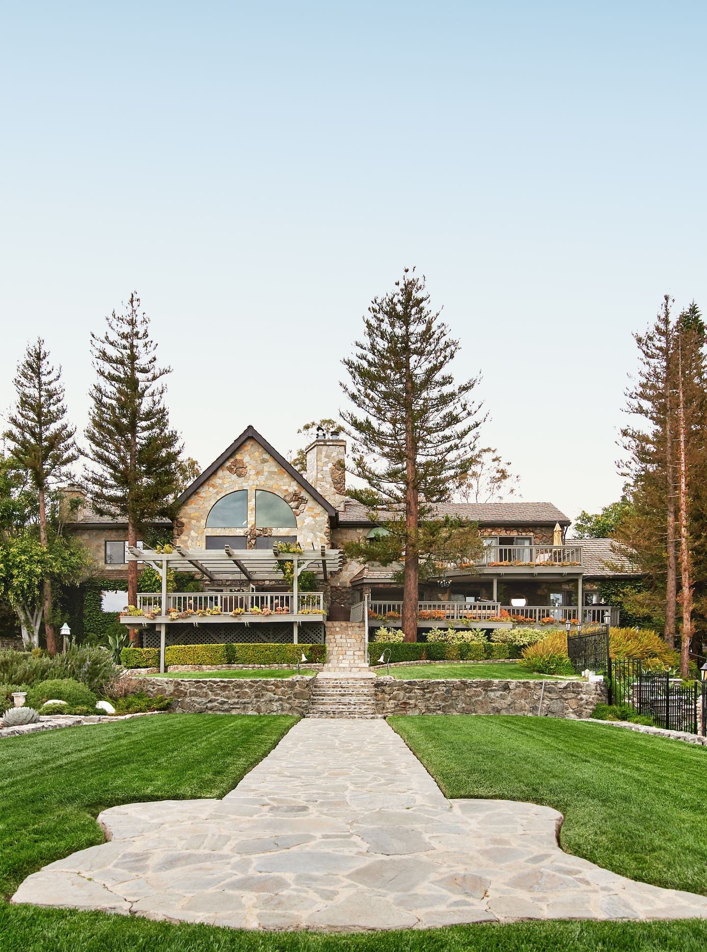 Images may contain grass plants in outdoor buildings, buildings natural landscape house trees and bird's eye view